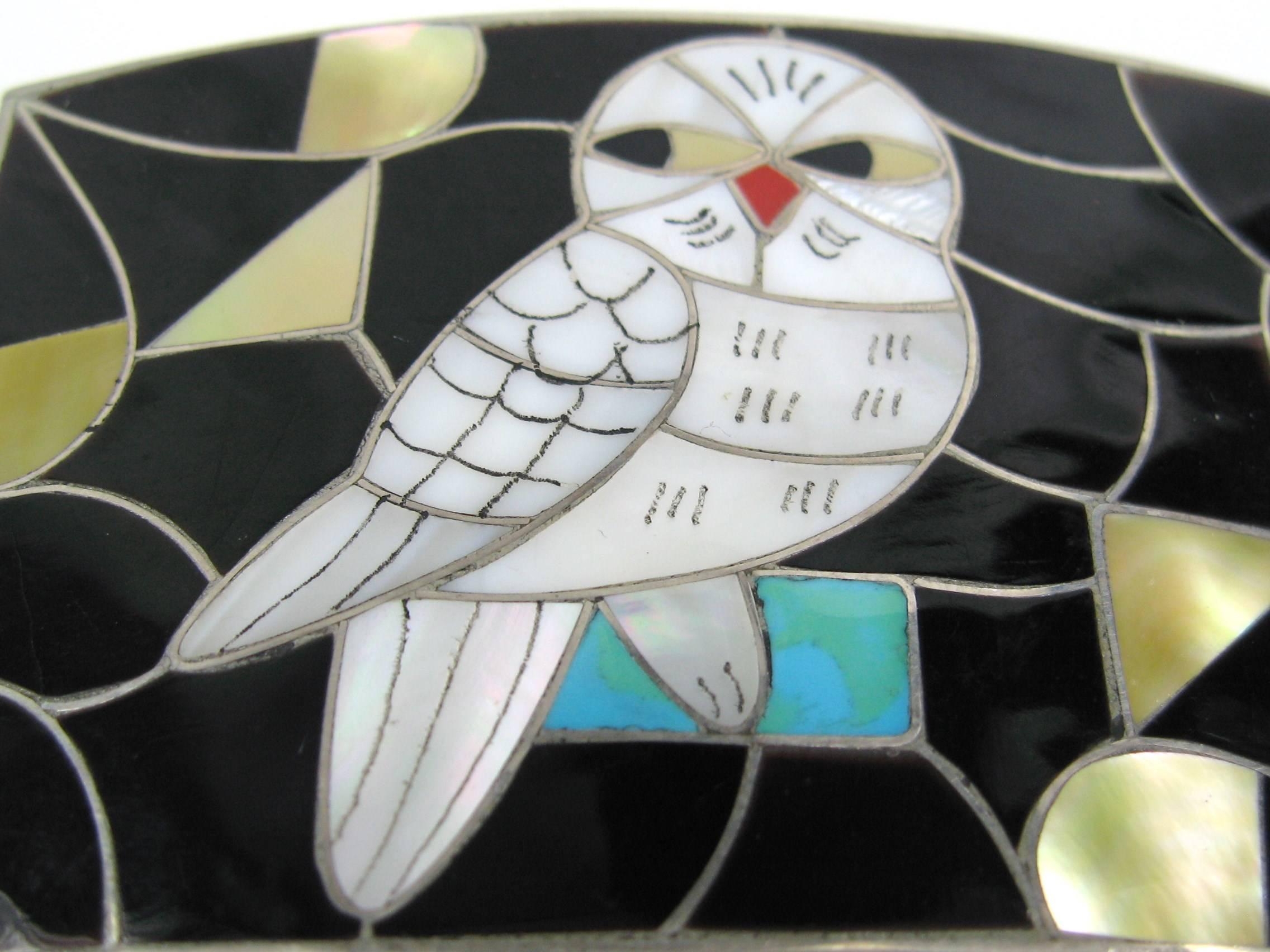 Stunning Zuni Belt Buckle This is a fantastic vintage Native American handmade buckle featuring a wonderful OWL. The inlay work is amazing! Artists Porfilio and Ann Sheyka. Porfilio and Anne are known for their animal designs and this is among the
