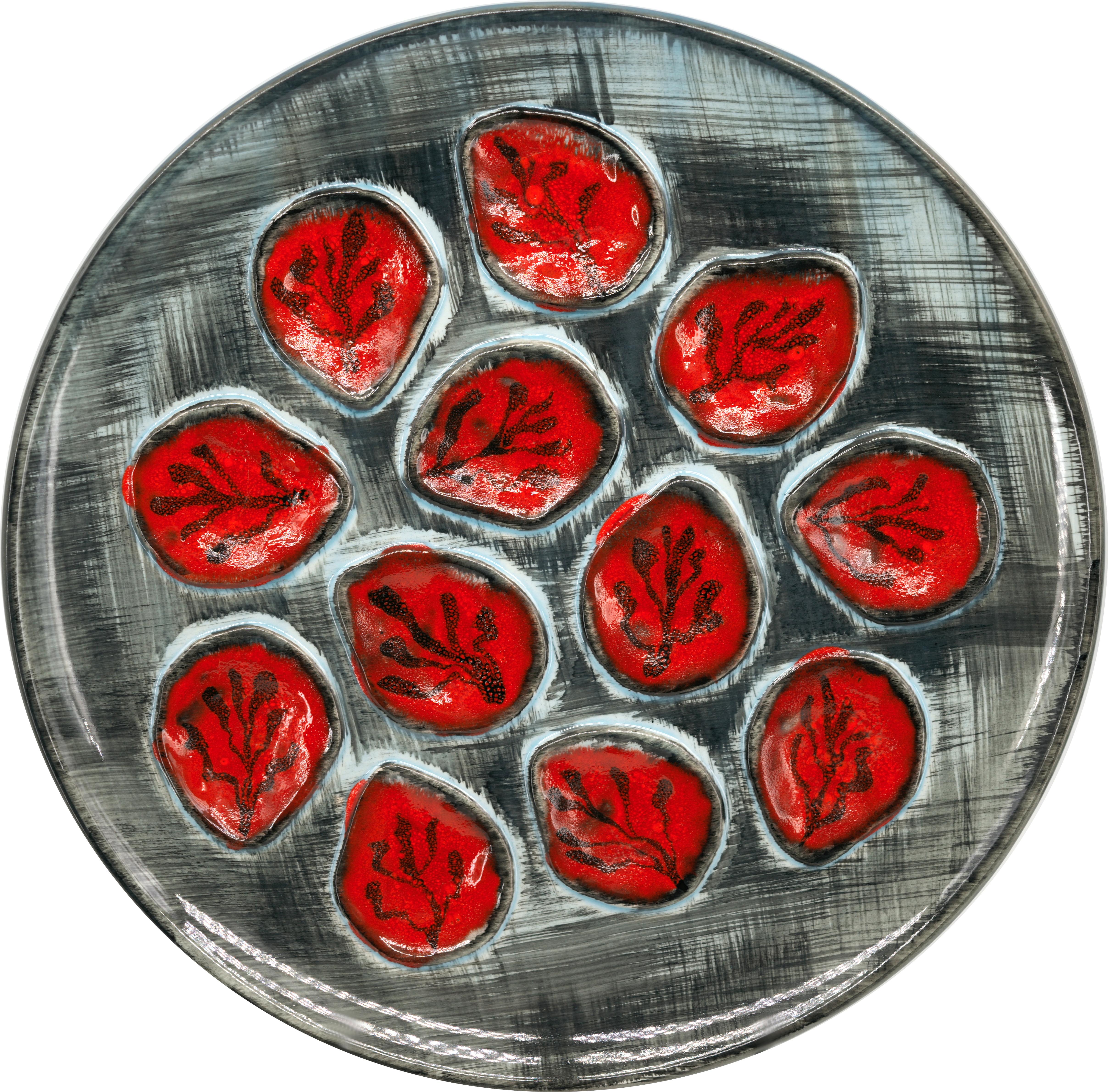 French art ceramic oyster set  by MBFA Manufacture Bretonnes de Faïences Artistiques (Pornic), France, 1950s. Set composed of a platter and 12 plates in excellent condition. So this set is complete which makes it an exceptional whole.  Measurements