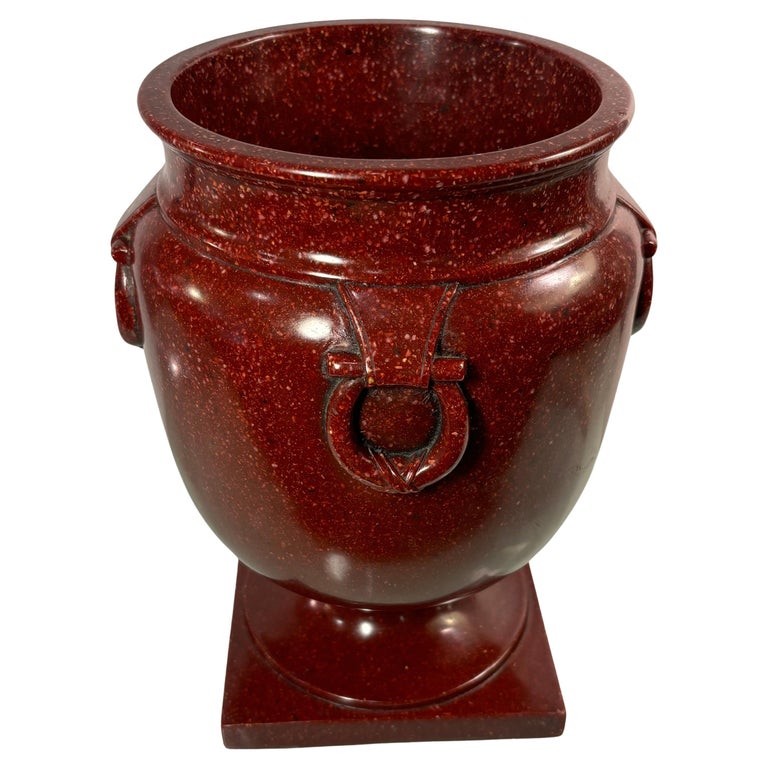 A Porphyry Urn Form Raised on Square Base A Porphyry Urn Form Raised on Square Base