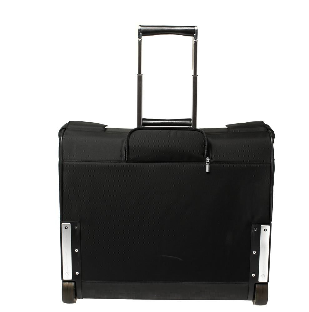Travel in style with this Porsche Design trolley luggage case. This bag in black has a telescopic handle, two wheels, and a spacious interior that can carry all your essentials. Offering a great look and durability, this luggage bag will be a