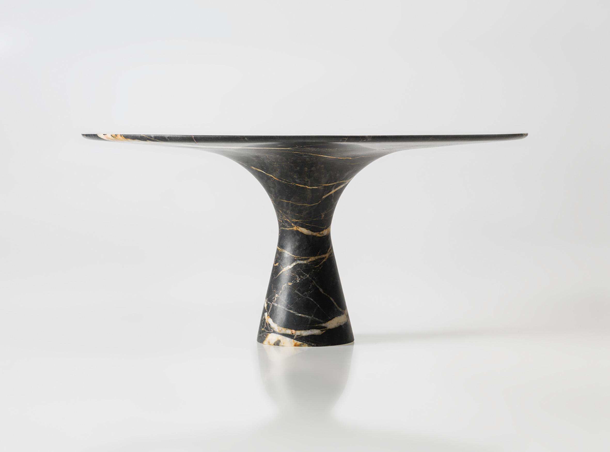 Port Saint Laurent refined contemporary marble dining table 250/75
Dimensions: 250 x 160 x 75 cm
Materials: Port Saint Laurent marble.

Angelo is the essence of a round table in natural stone, a sculptural shape in robust material with elegant lines