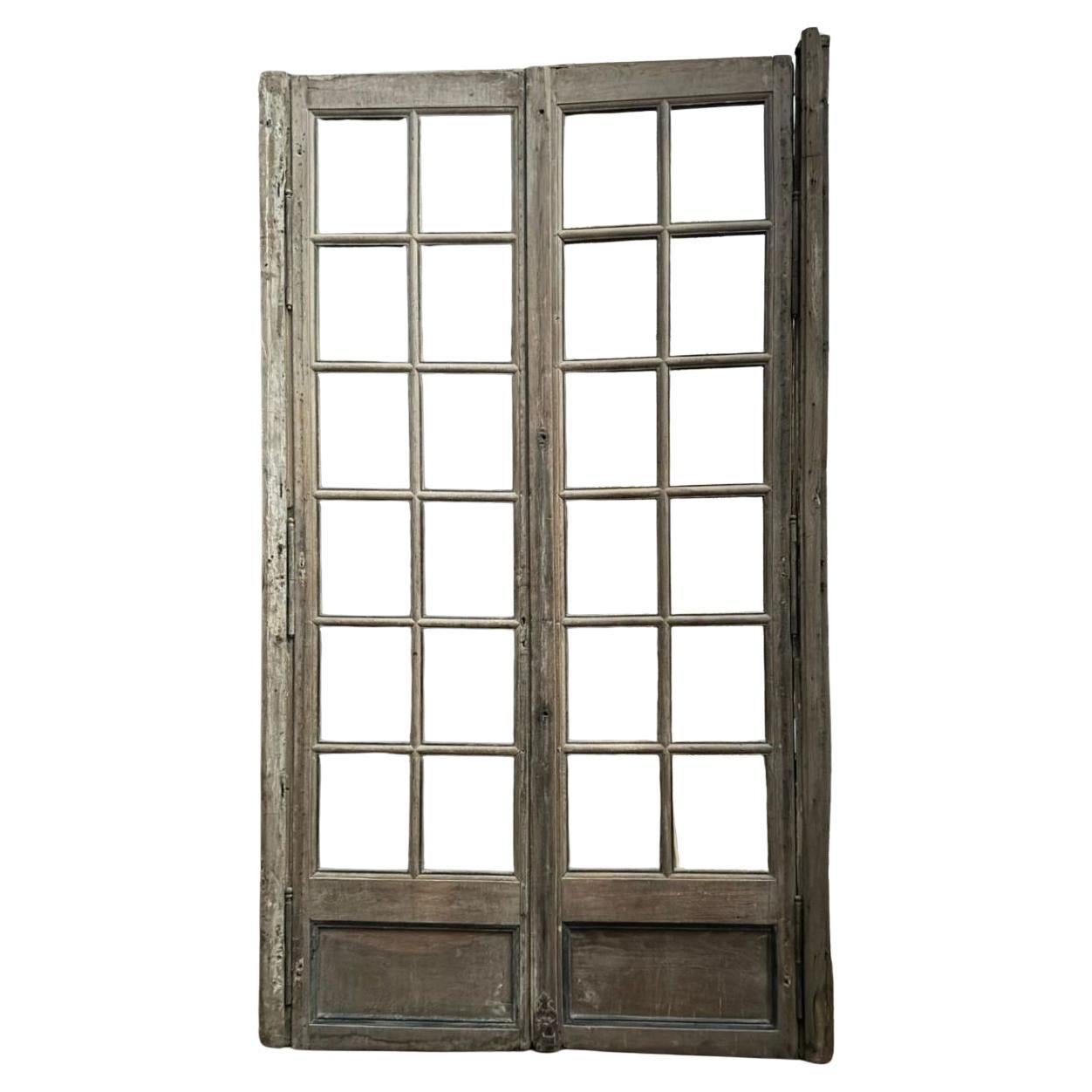 Porta a vetri in legno di rovere, due battenti con montanti laterali, Italia