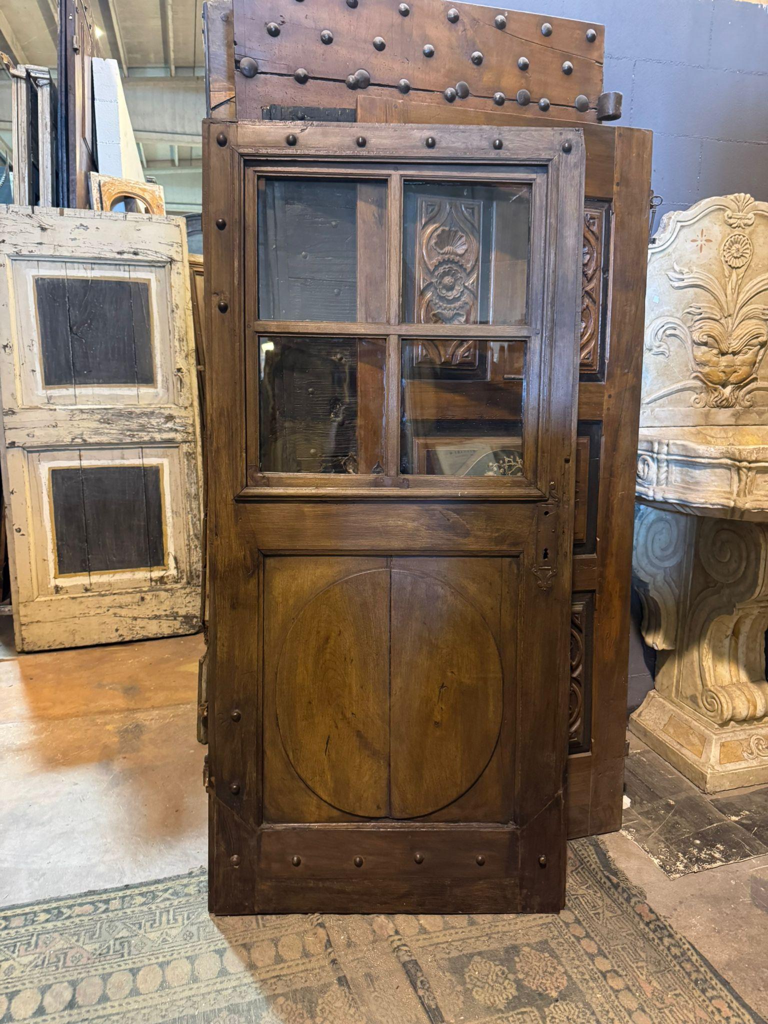 Italian Porta ad un battente a vetri, in legno di noce con ferri originali, italia in vendita