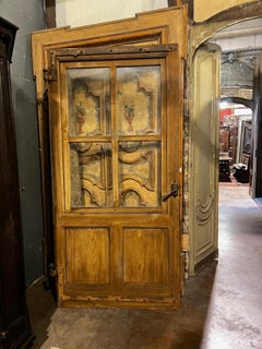 Single-leaf glazed interior door with opening window, Italy