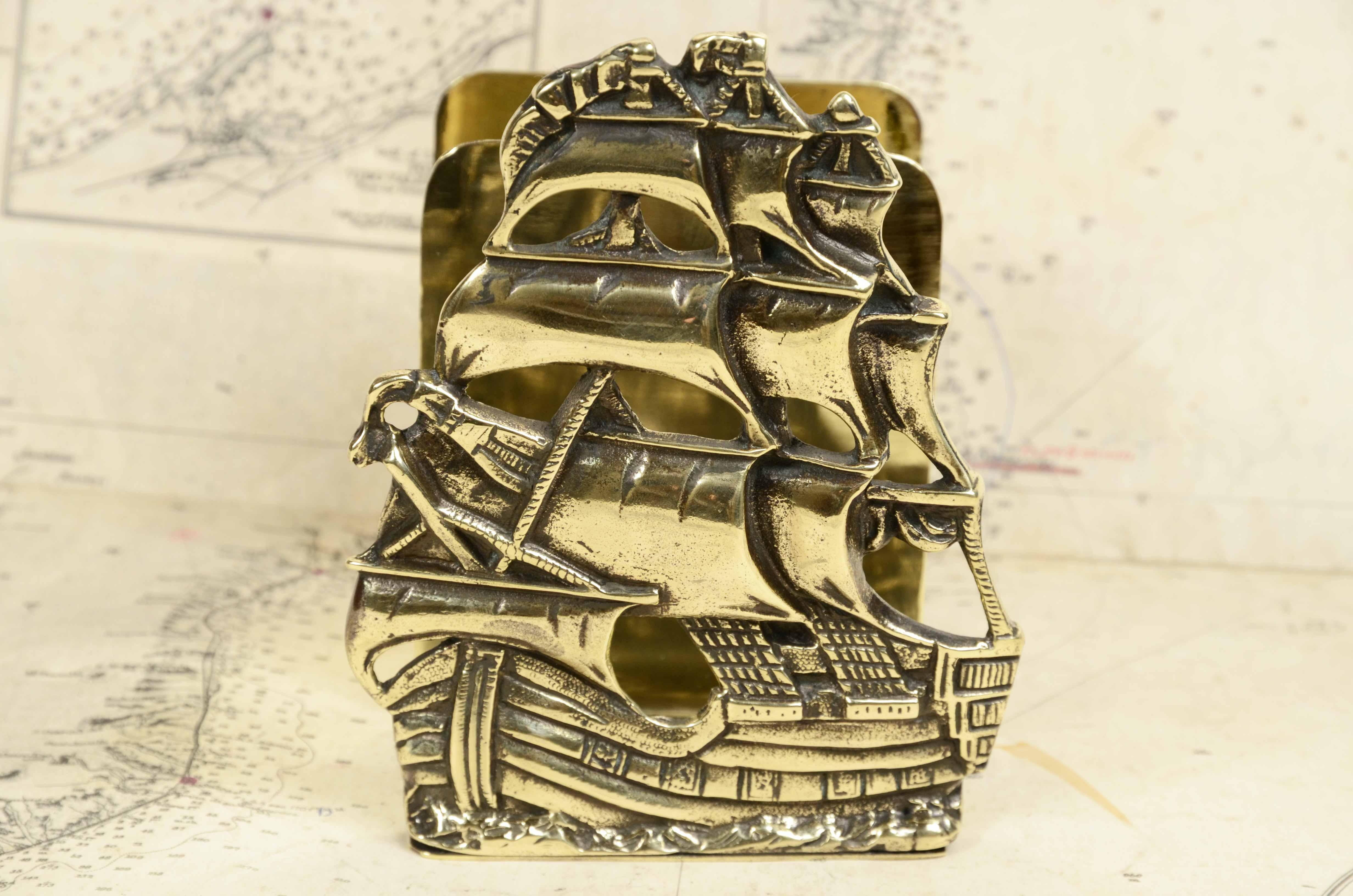 Brass letter holder with two  compartments depicting vessel with unfurled sails, lost-wax casting, early 20th century English manufacture.
Measures 11.5x11x14.5 cm - inches 4.4x4.3x5.7.
The Vessel, developed from the galleon, became from the 17th