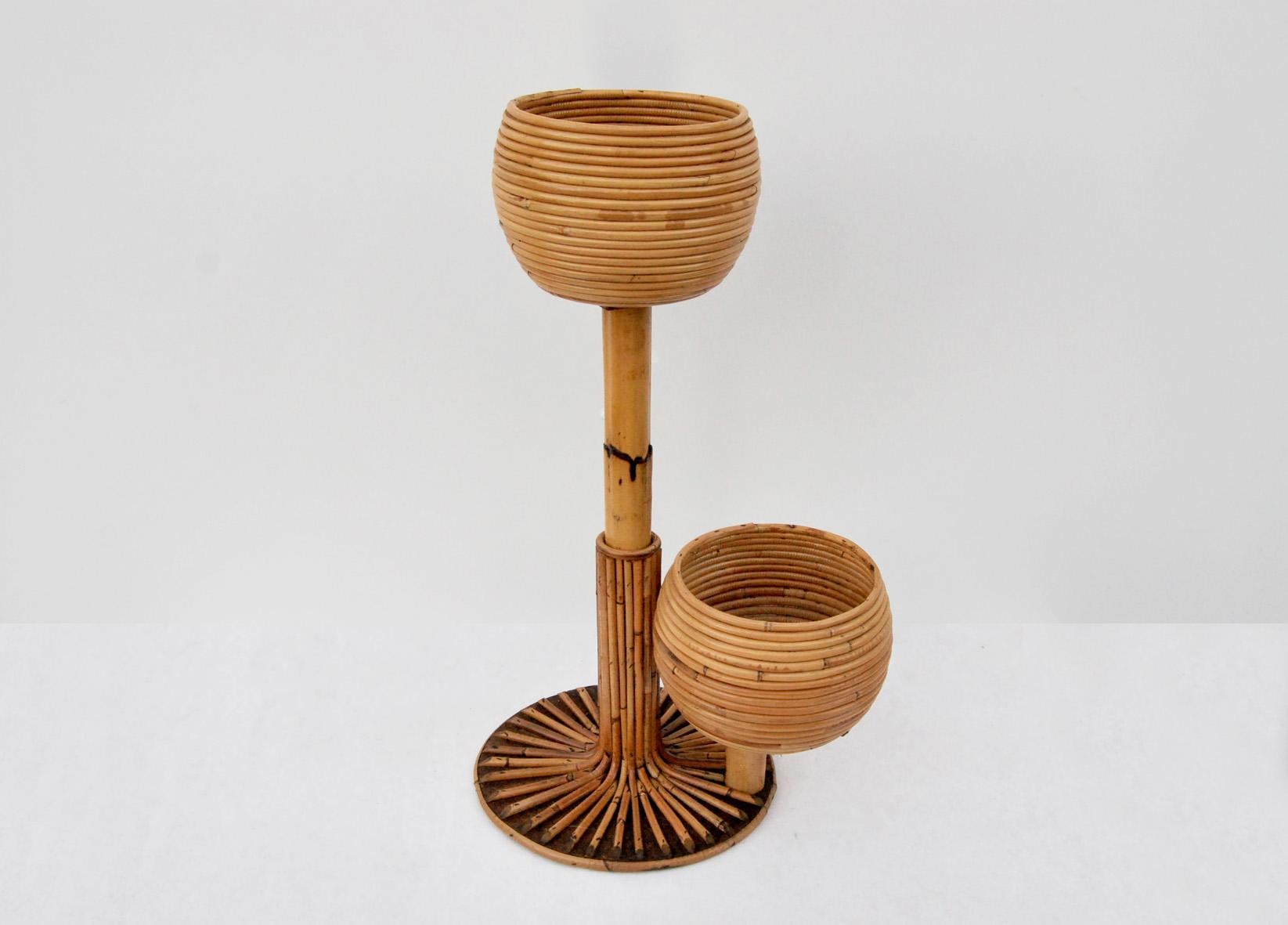 Rattan plant holder, Made in Italy, 1970s. 
Excellent decorative plant pot holder made of rattan. Conservative restoration. 
Condition is excellent, some slight signs of use due to time. 
The price of shipping is for the Italian territory, for the
