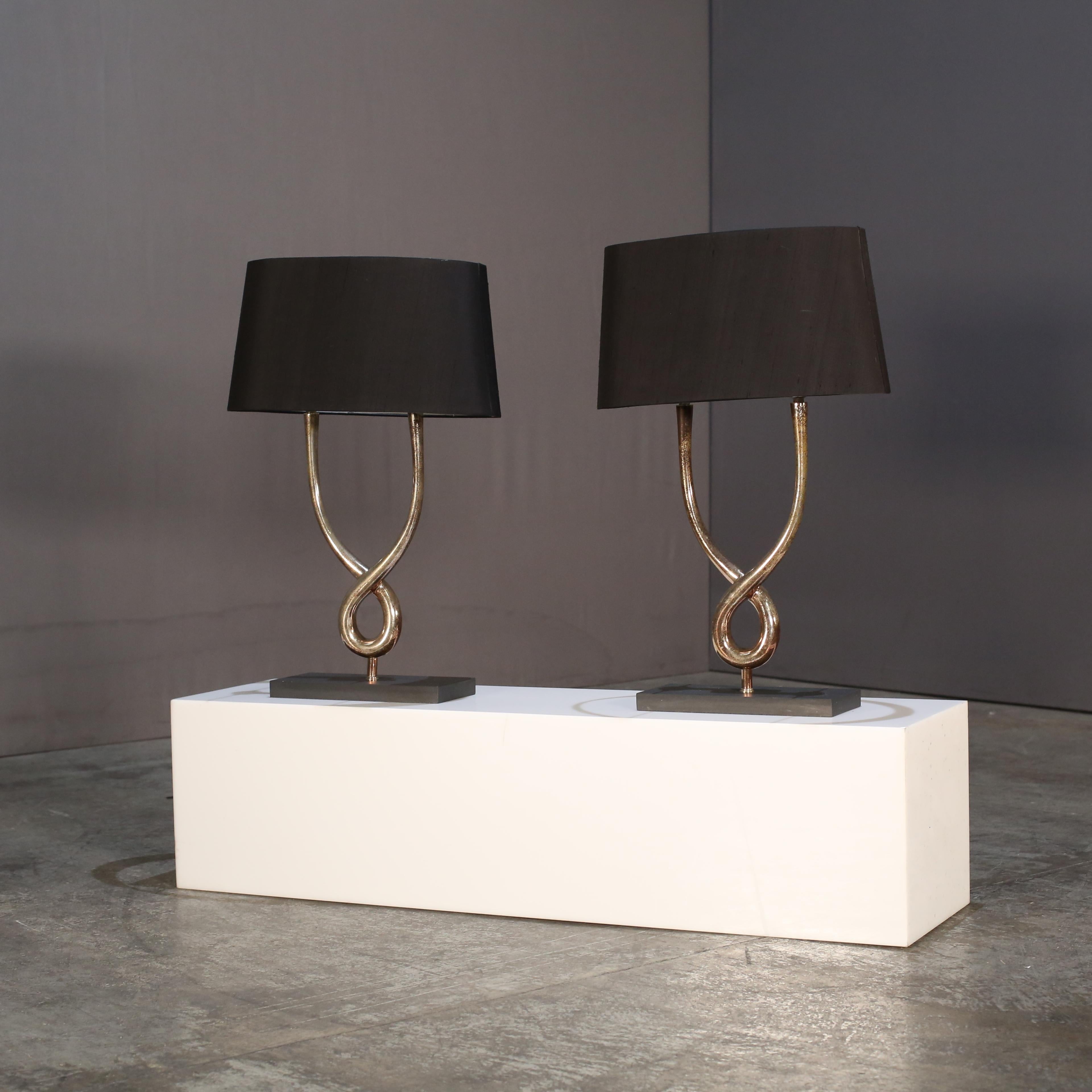Illuminate your interior with the timeless elegance of the Porta Romana Lamp. A true statement of craftsmanship, this exquisite piece features a beautifully sculpted base, showcasing Porta Romana’s signature attention to detail and innovative