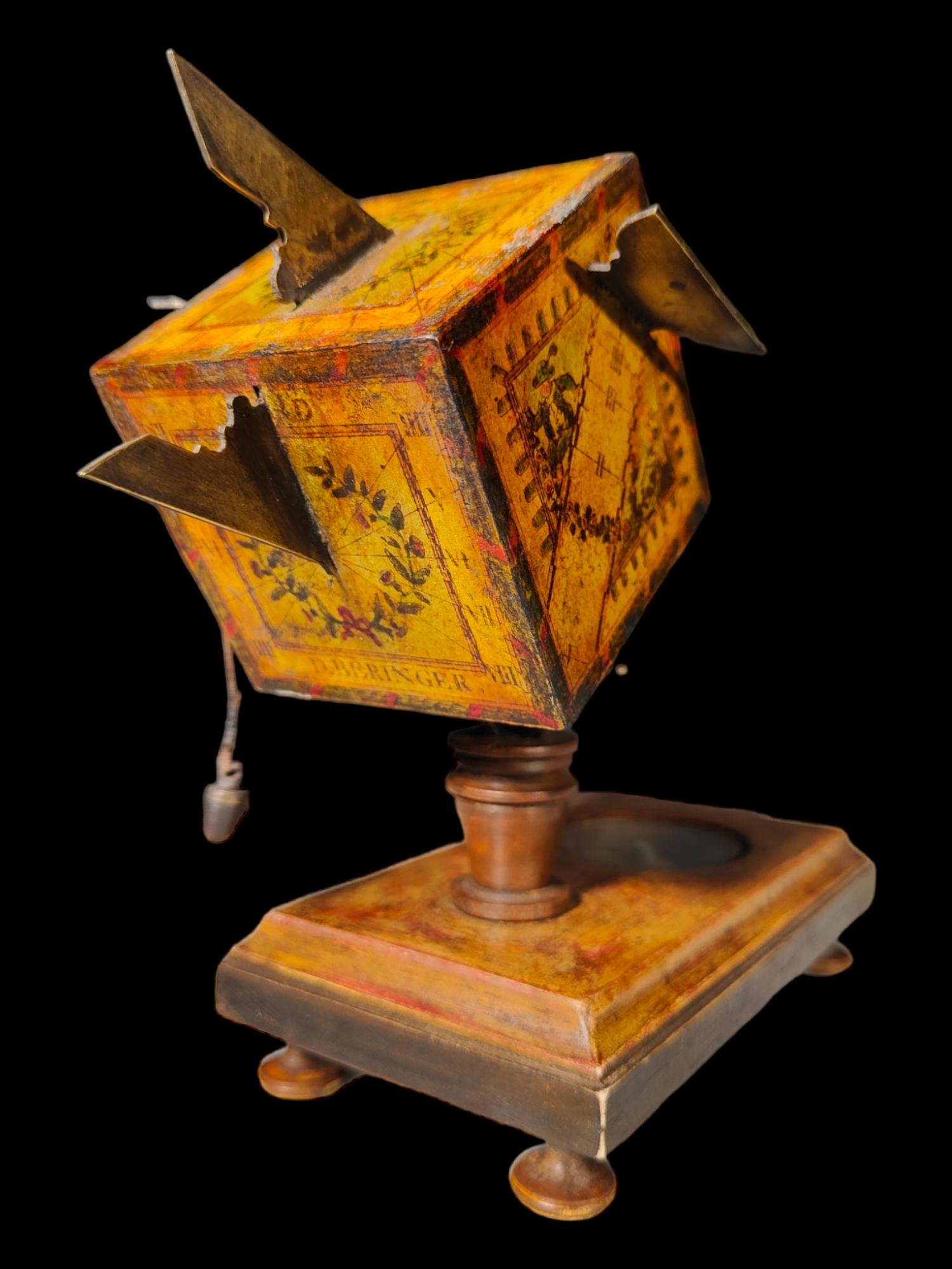 Portable cube sundial David Beringer circa 1780–1821
Beringer is best known for portable wooden sundials with scales printed on paper glued to the wood. These included cube dials and diptych dials.Some of Beringer's sundials were collaborations
