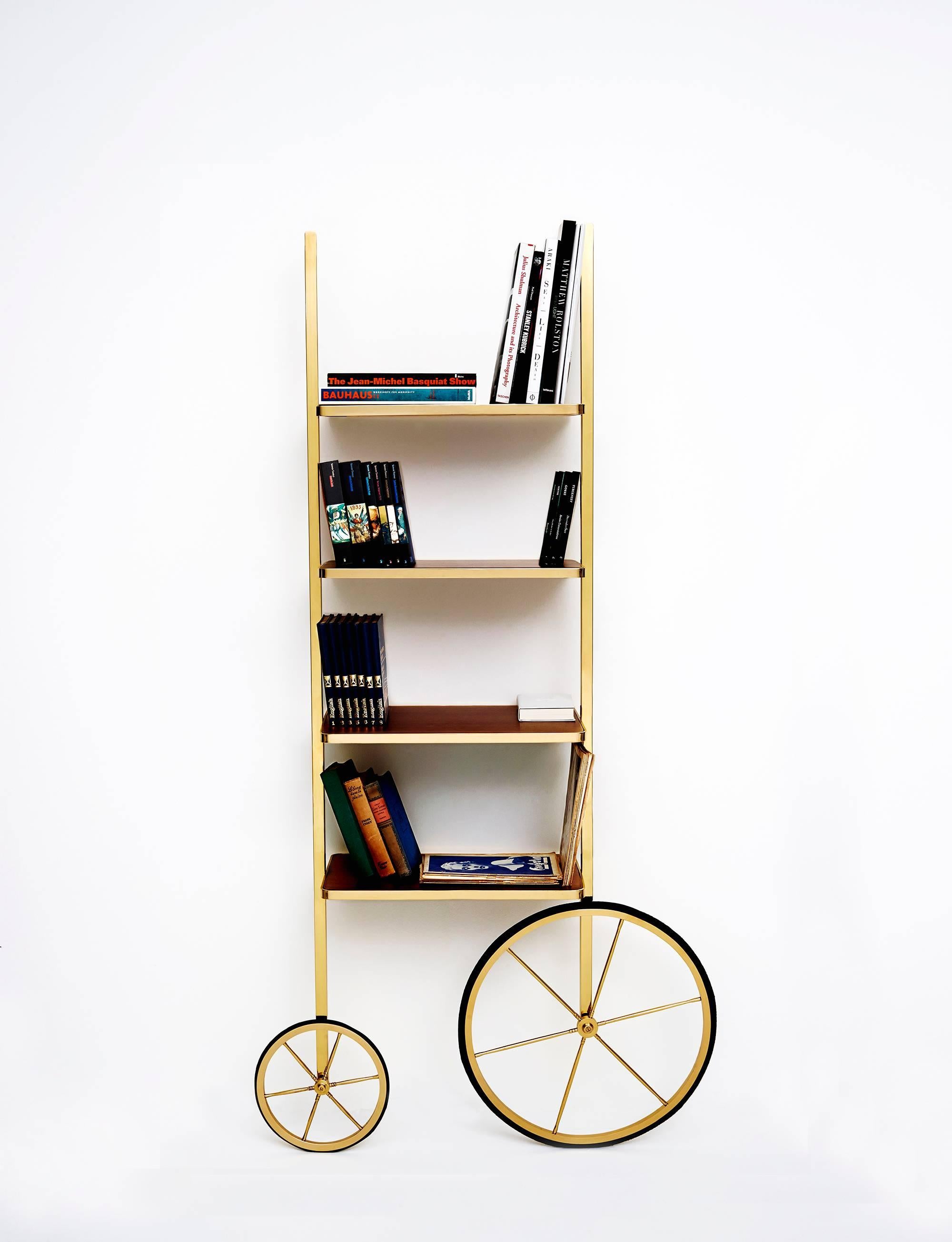 The design for Cyclopedia stems from the high wheel bicycles of the 1870s. Unlike most bookshelves, Cyclopedia differentiates itself through its portable structure. This unique piece is a library and a display shelf that can be wheeled and