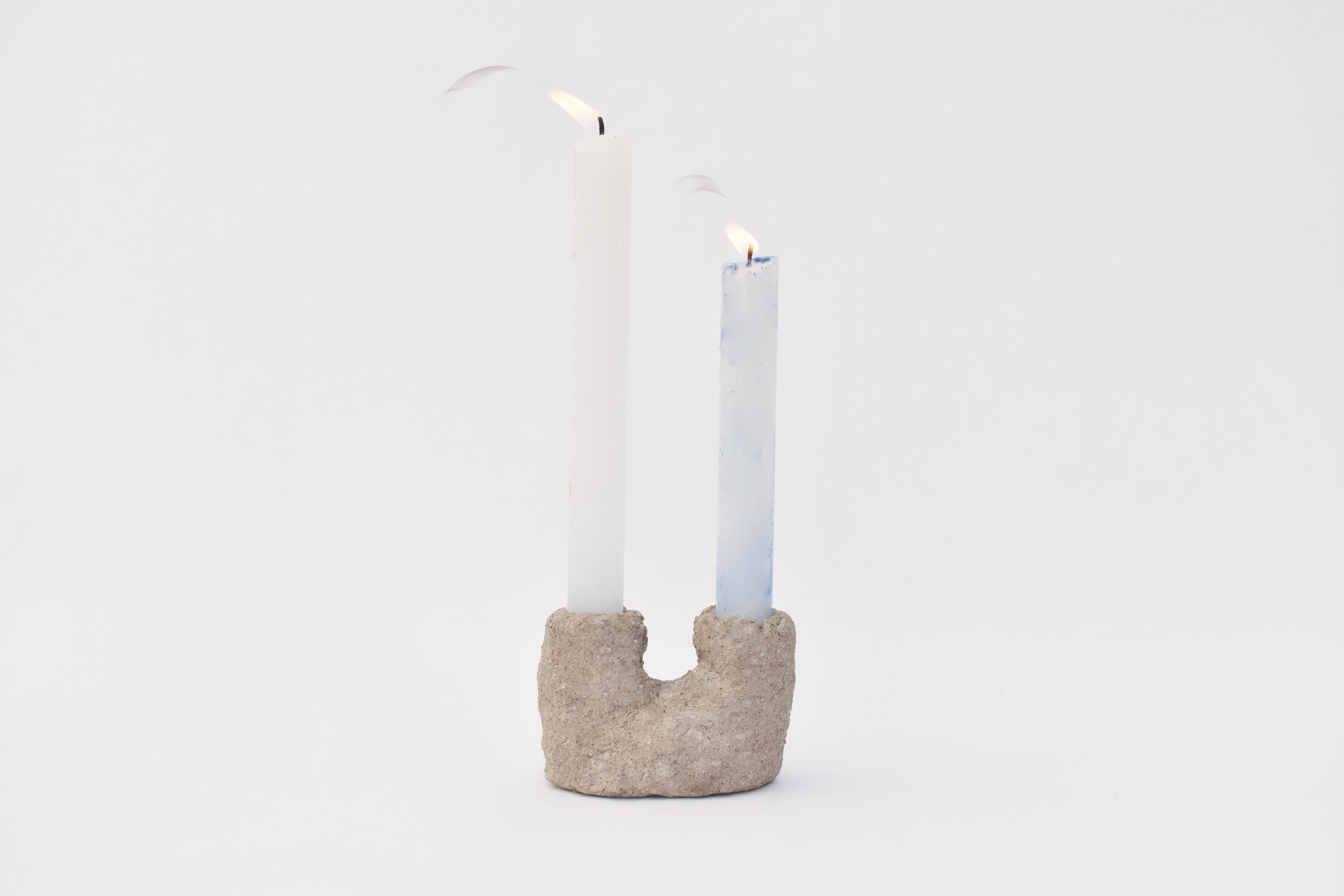 The Aka Candle Holder is perfect for adding a touch of elegance and sustainability to your home. Handcrafted from recycled paper, this unique piece evokes the beauty of marine corals with its organic shapes and intricate details, making it a true
