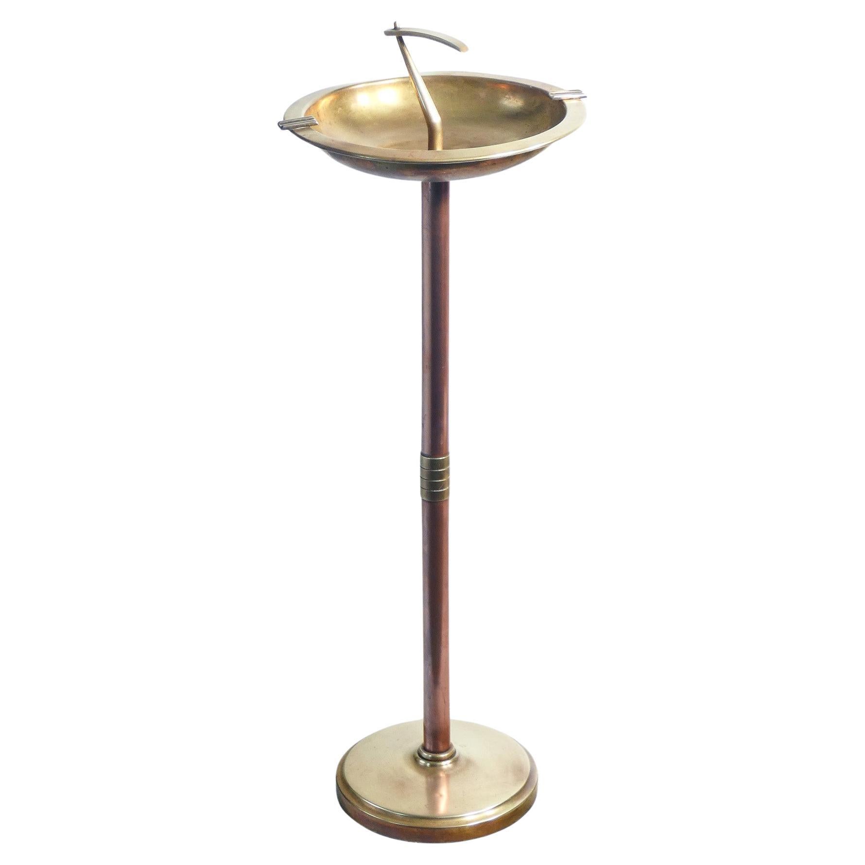 Art Deco floor ashtray made of brass and copper. Italy, 30s