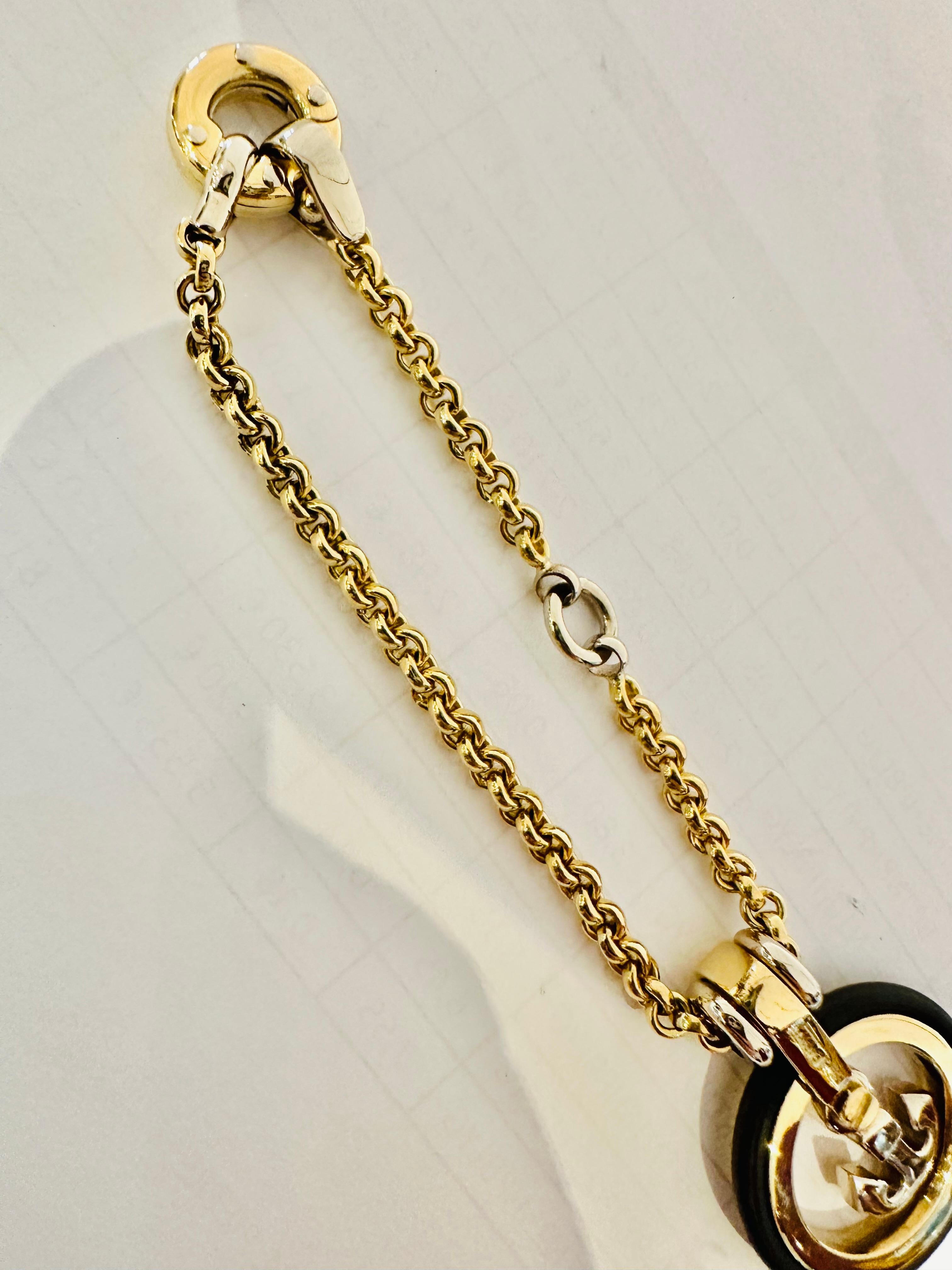 Llavero de oro amarillo y blanco de 18 quilates - Símbolo de fuerza y estilo náutico en venta 2
