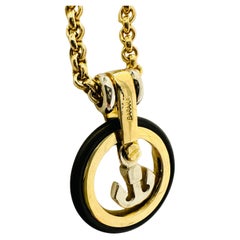 Porte-clés en or jaune et blanc 18kt - Symbole de force et de style nautique