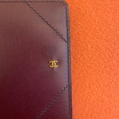 Portafoglio CHANEL vintage in pelle color bordeaux – anni '80 nuovo