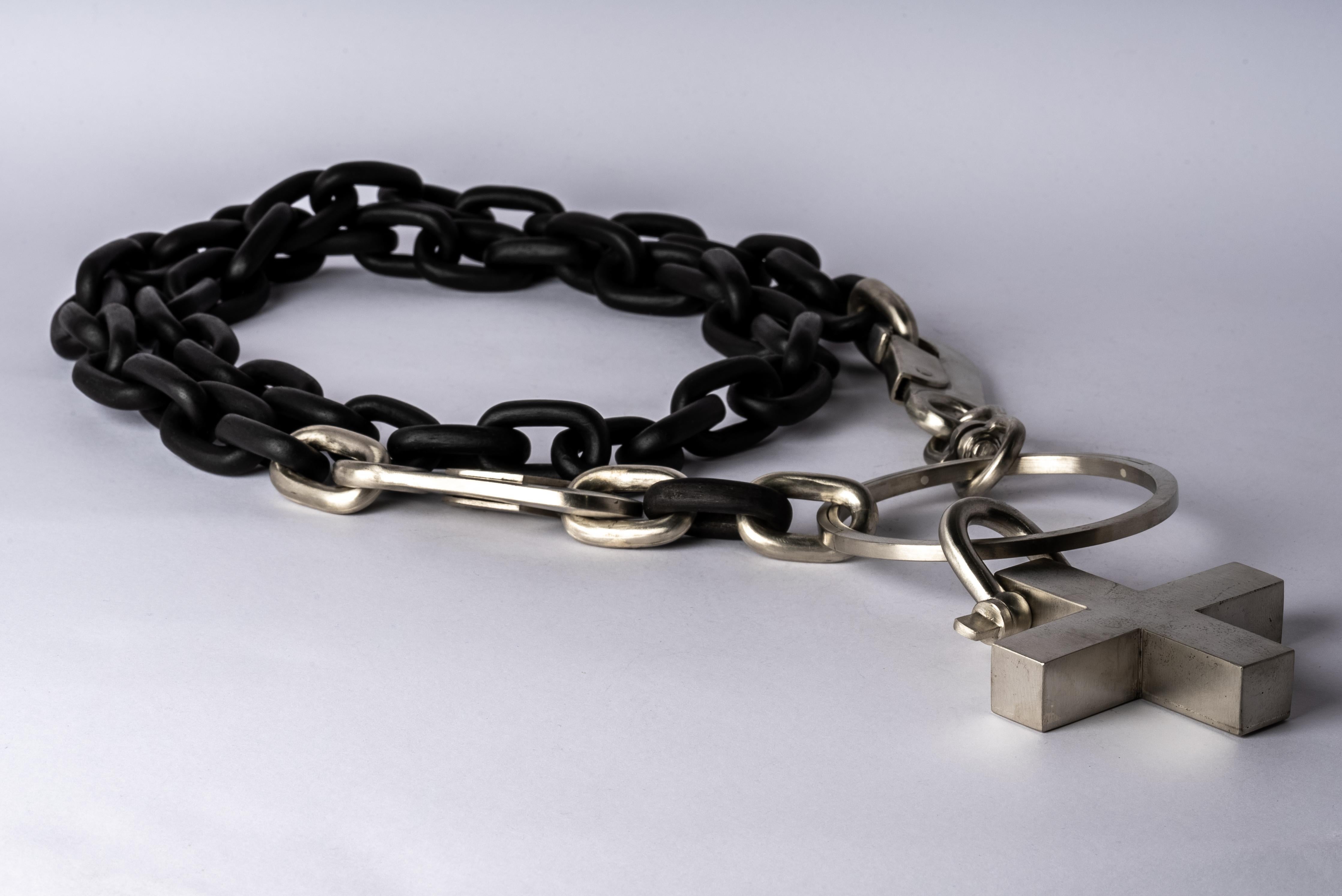 All organic chains are carved by hand. In the case of the chains made of wood, they are absolutely seamless; carved from a single long slab of wood (see link). The chain is completed by a system of pendant : a portal and a plus charm. 
Chain length: