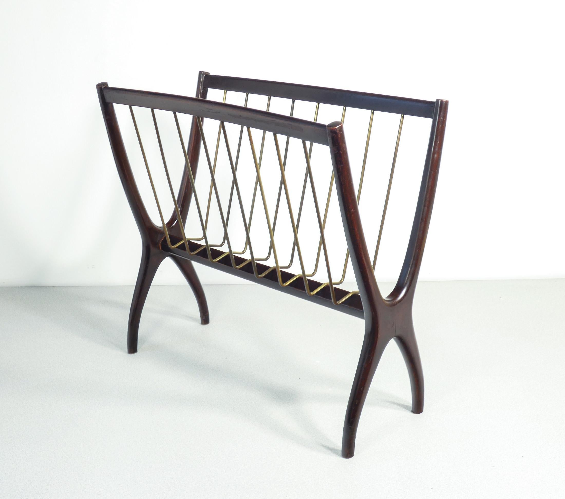 Magazine rack design
Caesar LACCA
wood and brass.

ORIGIN
Italy

PERIOD
1950s

DESIGNER
Caesar LACCA

MATERIALS
Lacquered wood, brass

DIMENSIONS
Height: 47cm
Width:- 51.5cm
Depth: 24 cm

CONDITIONS
The magazine rack is in good condition, as can be