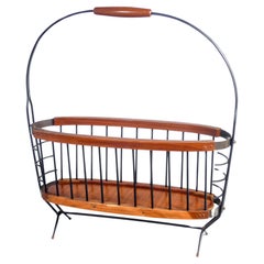 Vintage Italian design magazine rack made of wood and metal. Italy, 50s