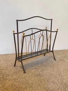 Italian Mid-Century style magazine rack from the 1970s made of metal and brass
