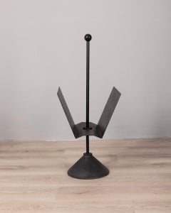 Vintage 80s black metal magazine rack design Porada furniture