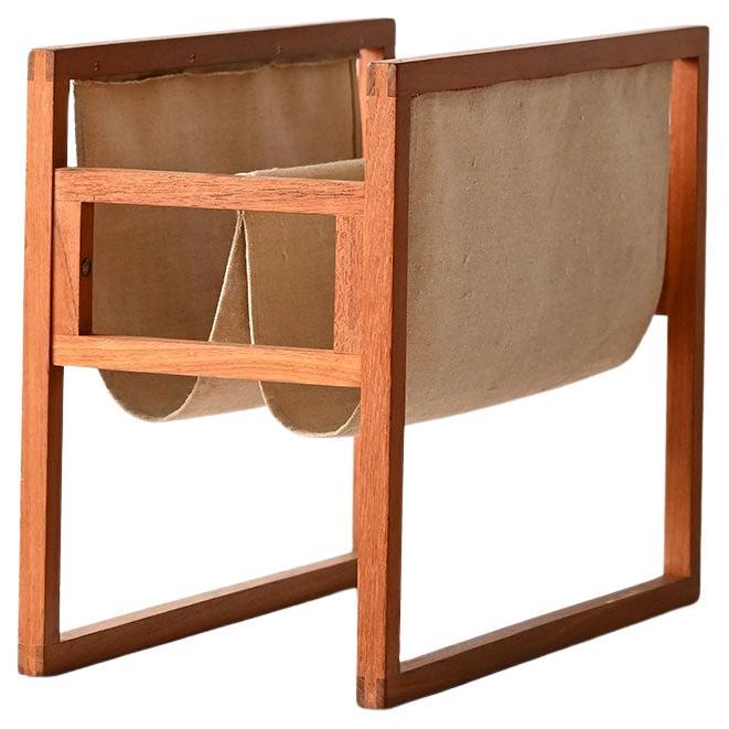 Vintage teak magazine rack by Henning Wind-Hansen