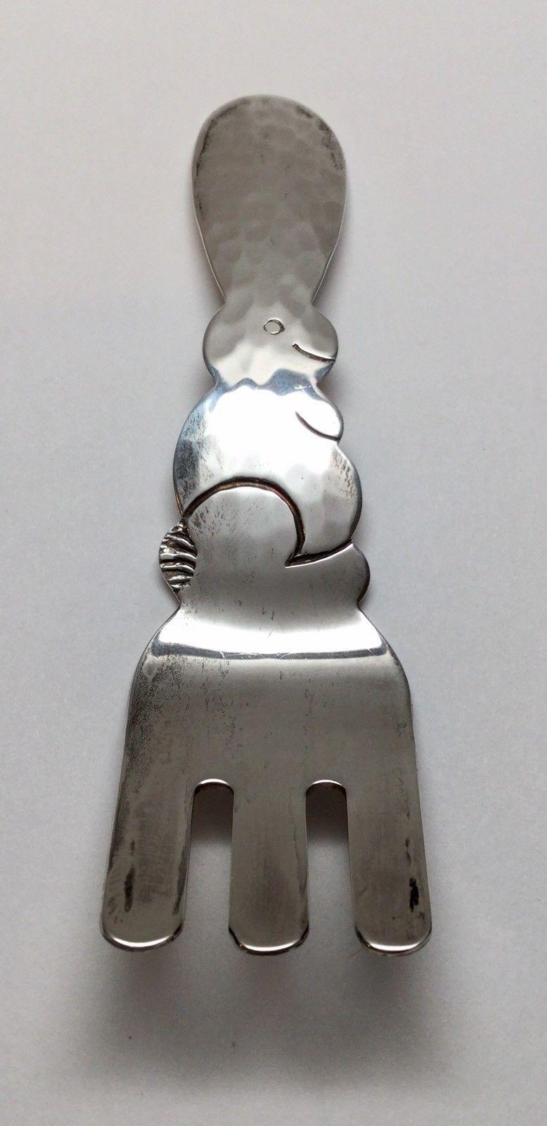 Porter Blanchard hammered sterling silver bunny baby fork. 
Marked: PORTER BLANCHARD HANDMADE STERLING. 
Measures: 4