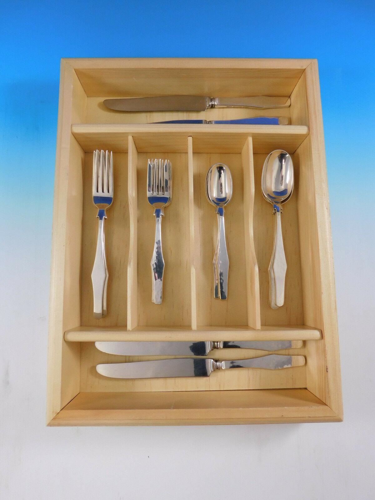 Scarce handmade Porter Blanchard (pattern unknown) sterling silver flatware set with unique modern design, 20 pieces. This set includes:

4 dinner knives, 9 1/2