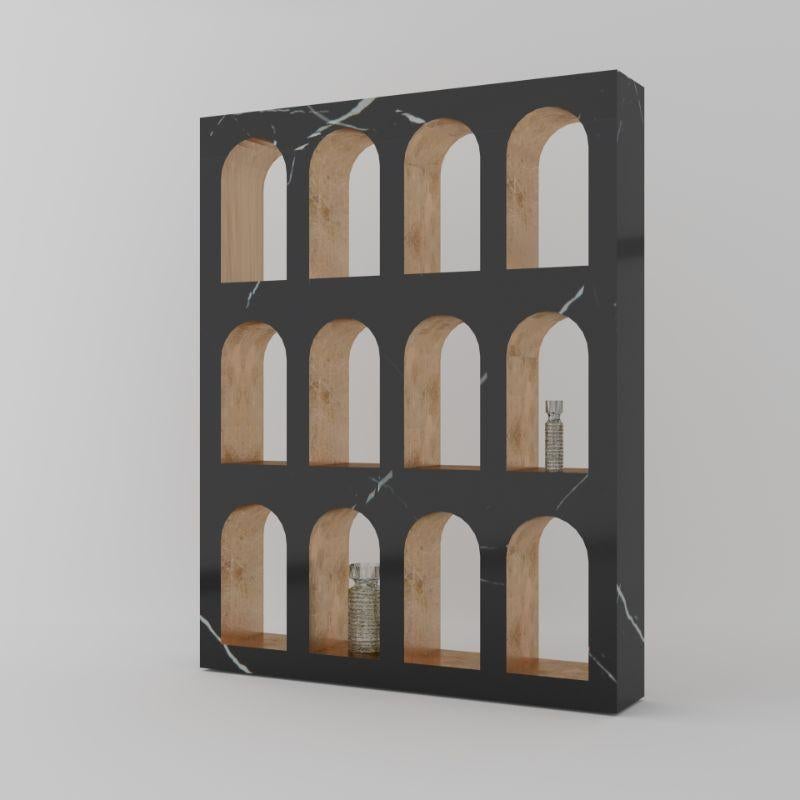 Portici bookcase, Marquinia by Sissy Daniele
Dimensions: W170 x D30 x H215 cm
Materials: Marquinia, bronze

Also available: Calacatta gold and fumigated wooden case packing,

Showcasing the elegant veins of marble, the bookcase Portici is an