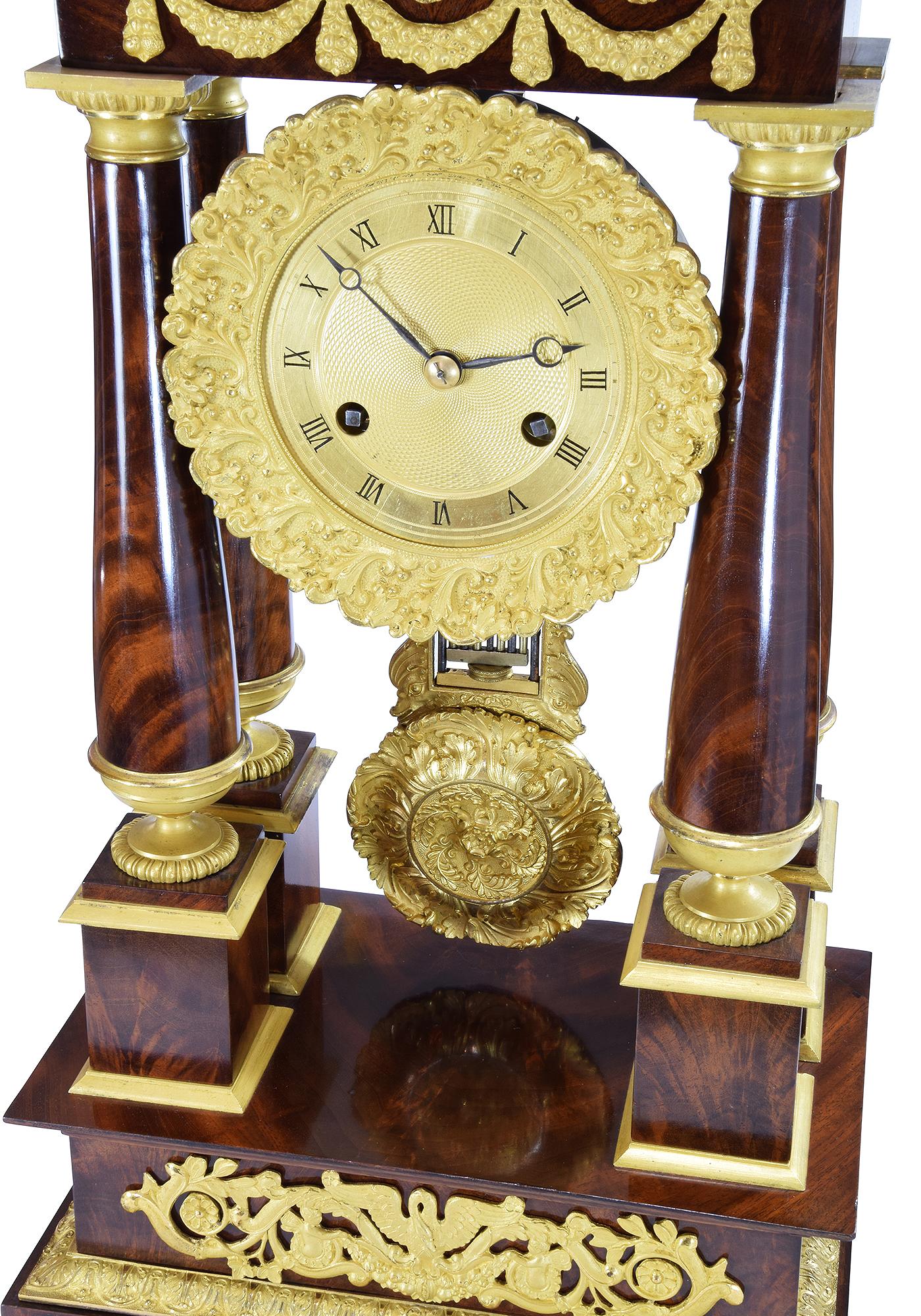 Charles X Portico clock in mahogany and bronze mercury gilding 1840
