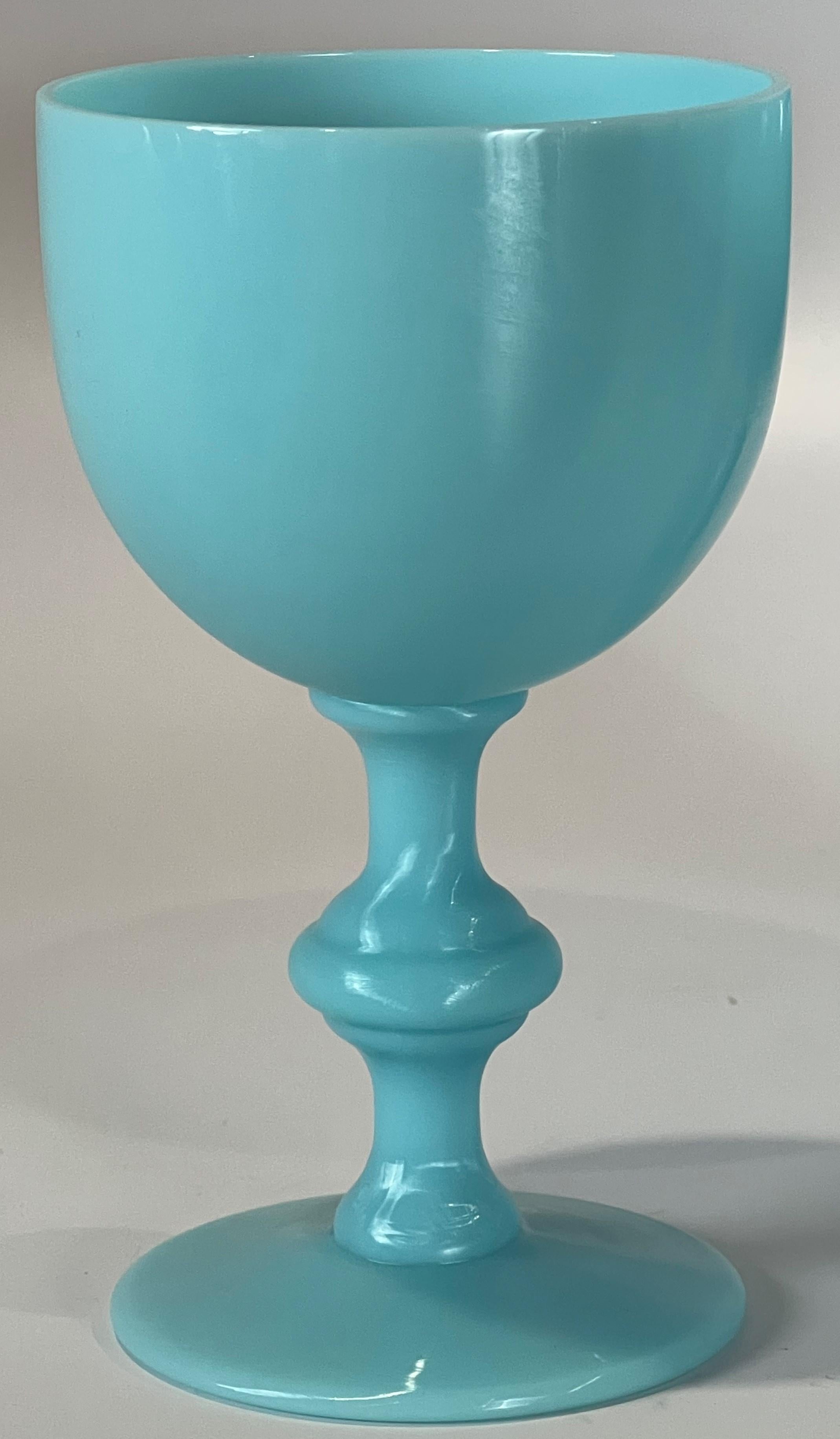 The blue opaline glass of Portieux Vallerysthal has been admired and collected for generations. This is a pair or Sherberts and a pair of wine or cordial glasses. Just perfect for a pleasant evening tete a tete. The third cordial has a tiny flake,