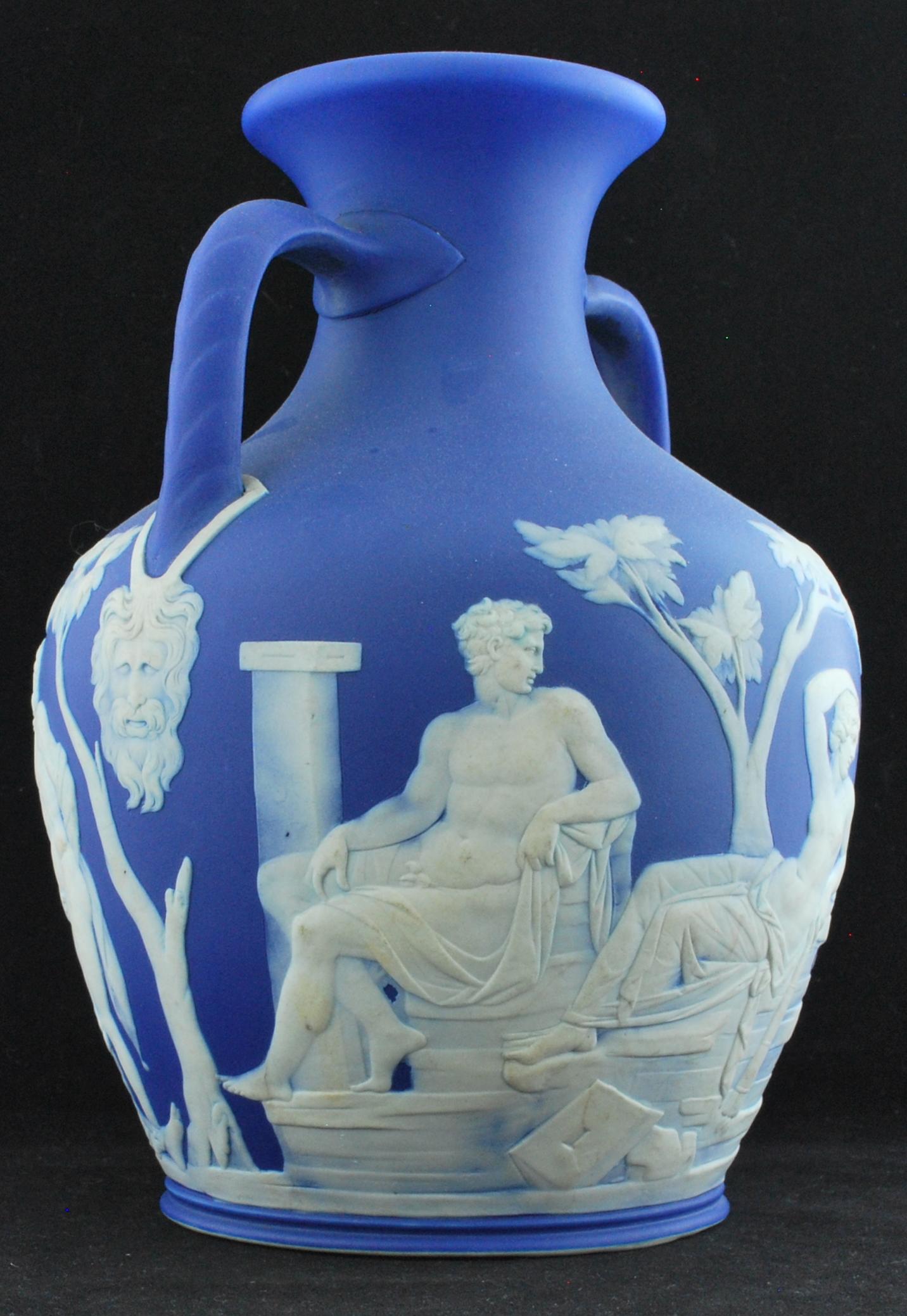 A full-sized Portland vase in cobalt jasper dip. This is the 'undraped' version, meaning it follows the original, rather than having draperies strategically placed. 

A superb example, with really good translucence. At this time, large jasper