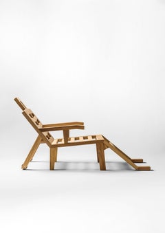 Lettino da sole di Salvador Dalì modello "Portlligat" design surrealista in legno di iroko