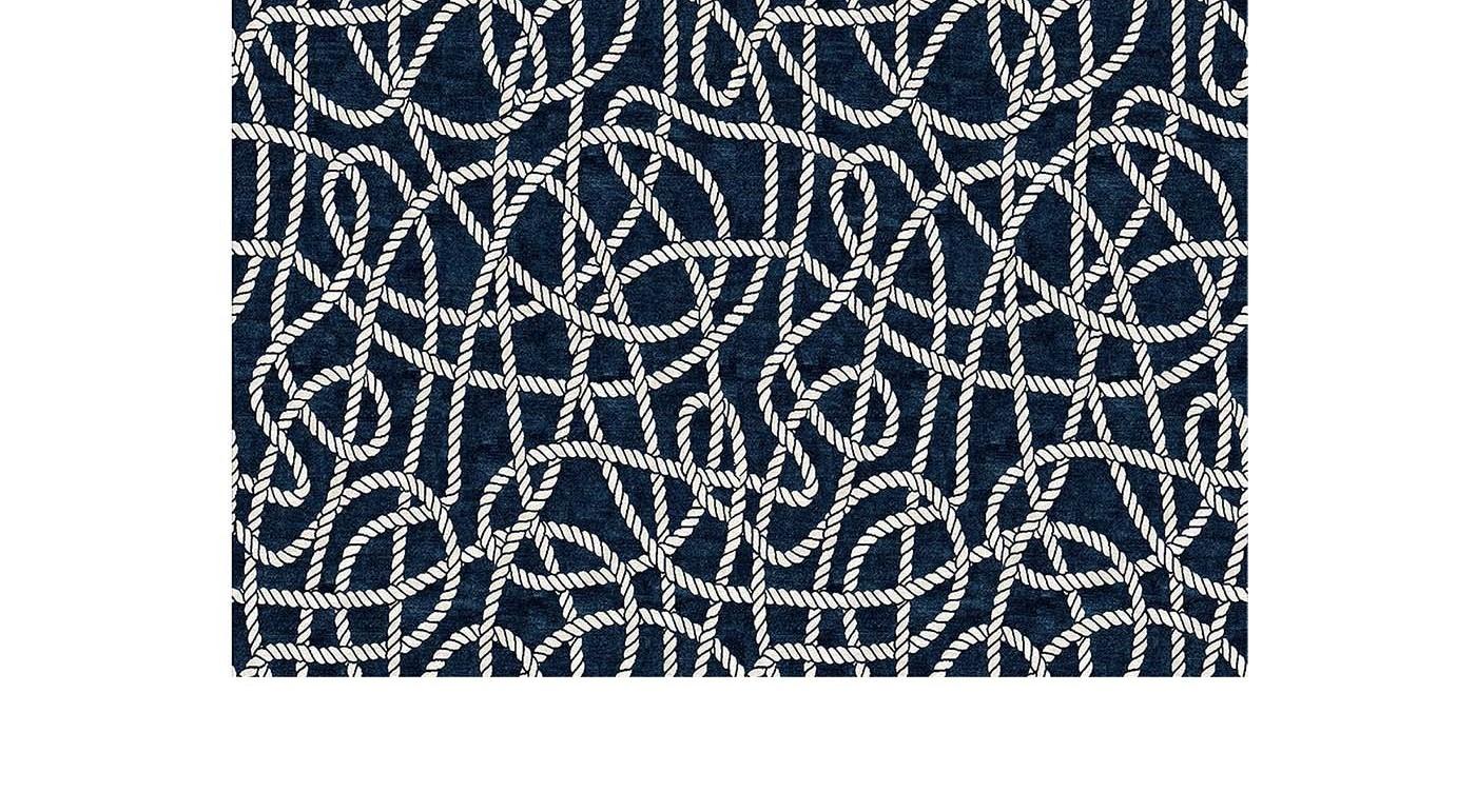 Inspired by the charming and luxurious sea town of Portofino, in Liguria, this elegant rug will be an ideal choice for a coastal interior or a refined boat. This unique piece is hand knotted by expert artisans in Nepal using 50% Himalayan wool for