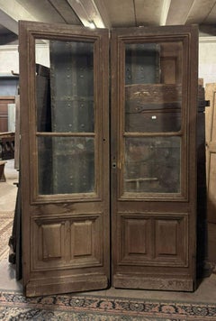 Molded oak storefront door with glass panels, Italy