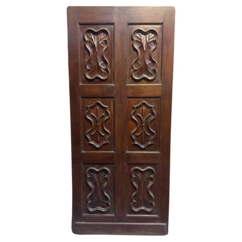 Walnut entry door, single-leaf main door with carved panels For Sale