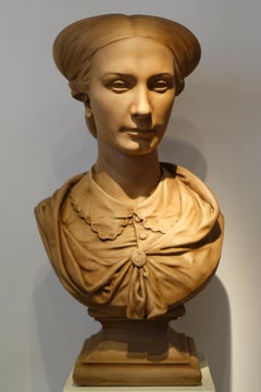 Portrait dans le buste d'une jeune femme, plâtre signé Dantan Jeune, 1867.