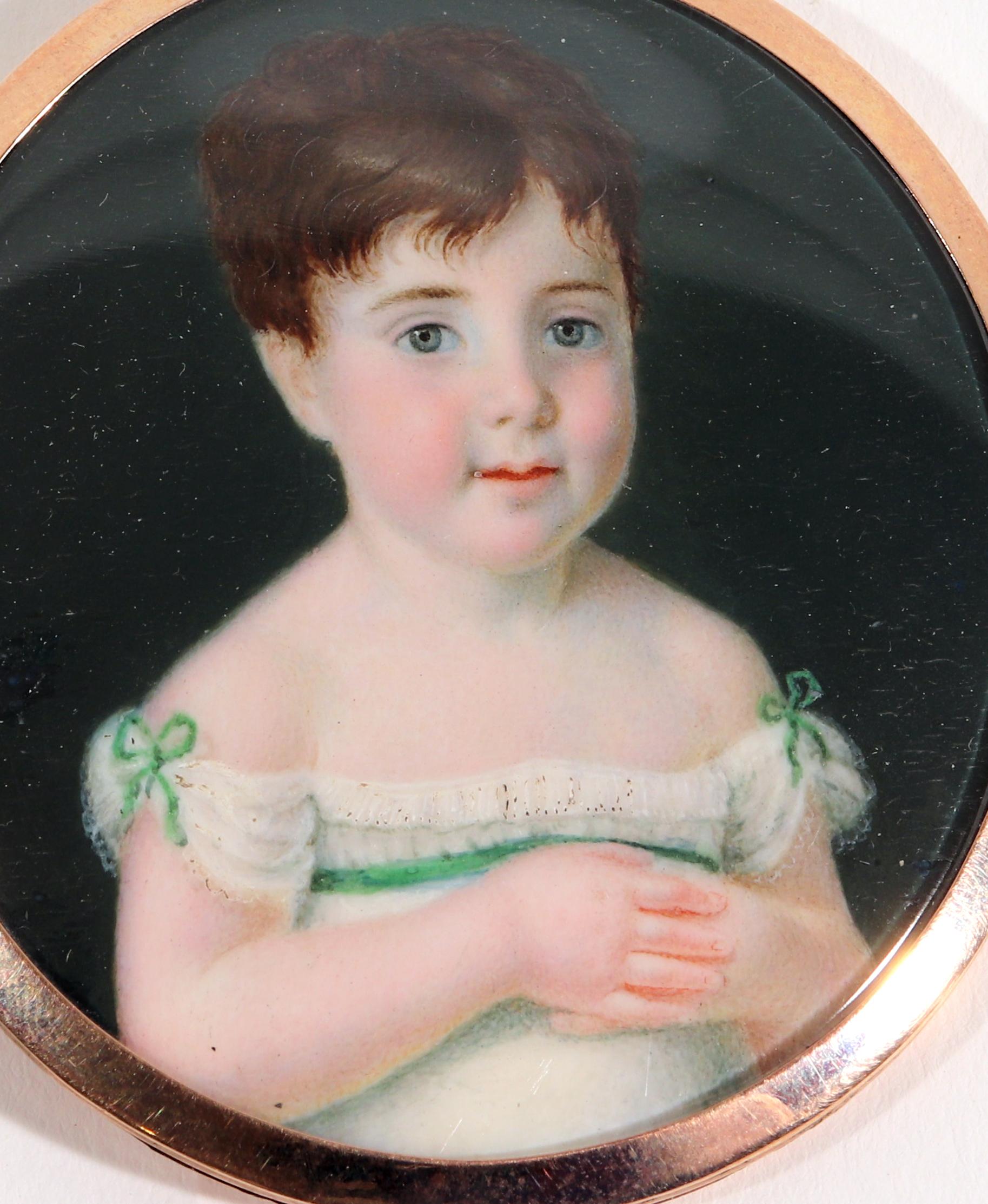Portrait Miniature of a young girl, 
Signed Corno 1817

The large oval miniature within a gold frame and raised hanging loop depicts a young girl facing to the front left wearing an off-the-shoulder white dress with a green sash across the chest