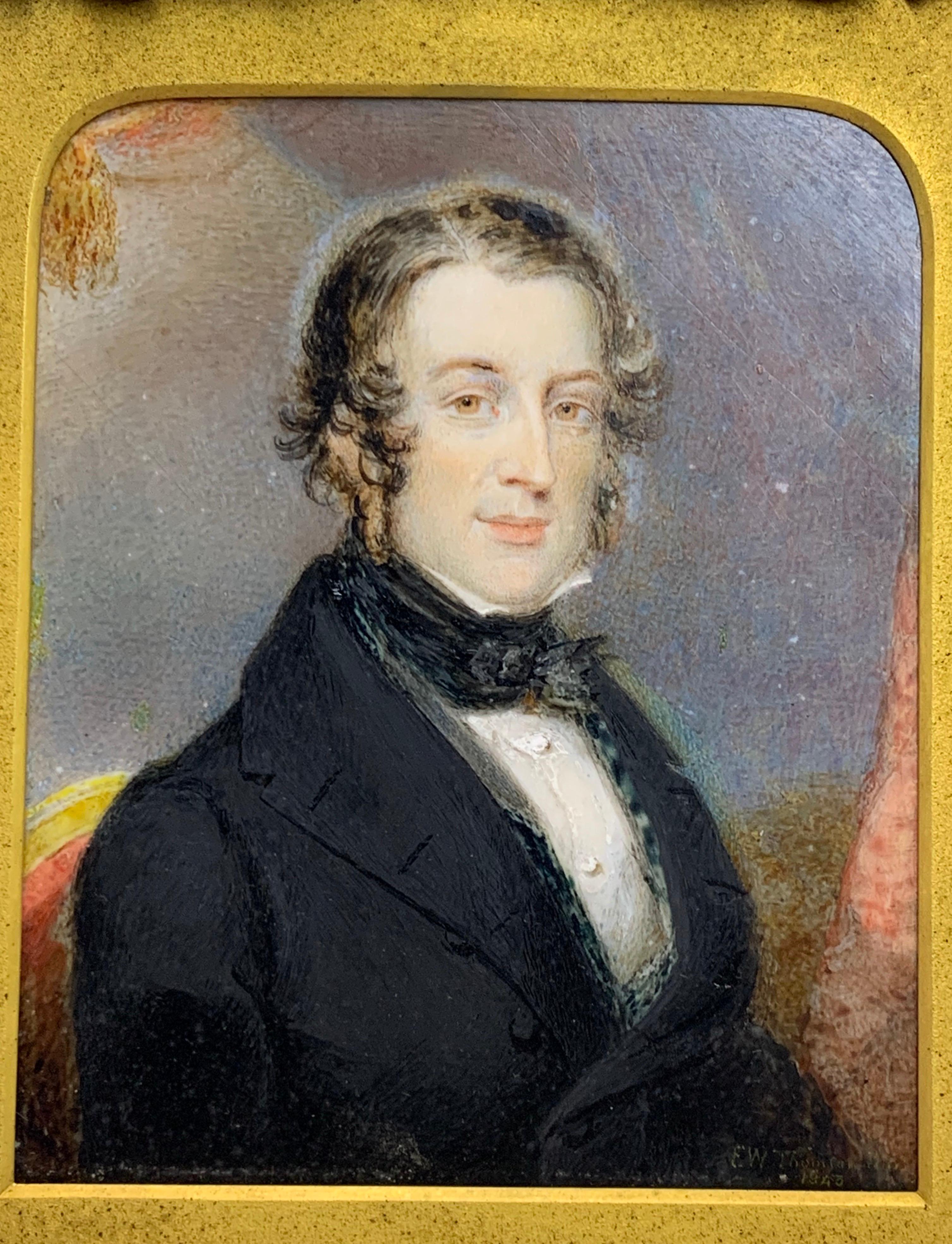 A Portrait miniatures of a gentleman, seated wearing black in a Victorian interior.
This is a Watercolour that has been well painted, by Edward William Thomson (1770-1847) signed and dated E W Thomson Pinx. 1845 lower right, This is presented in