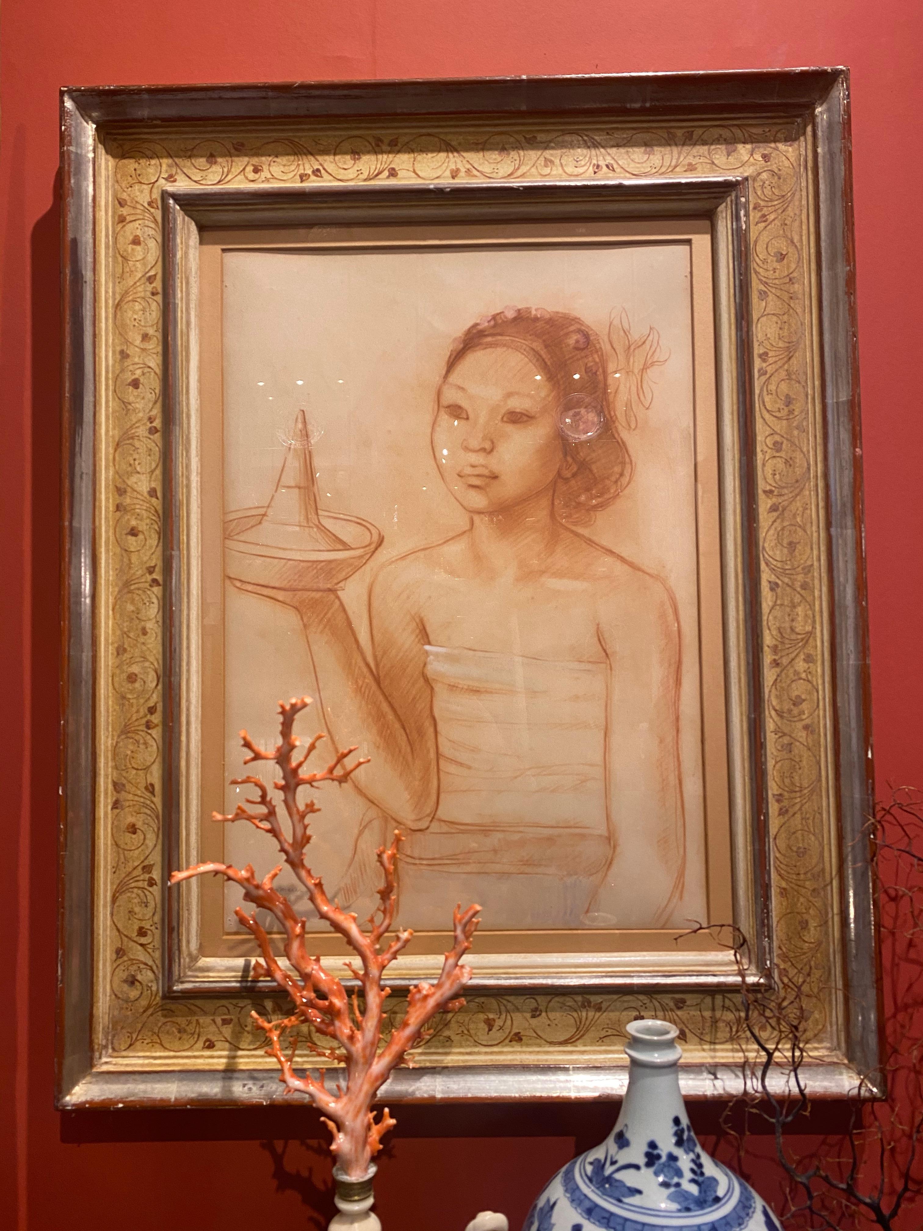 Theo Meier (1908-1982)

“A Balinese woman with offerings”

Signed, dated '36 and annotated Mankok (the name of the sitter) lower left

Sanguine on paper, measures: 57 x 41.5 cm
 

In a handmade and hand painted frame with address: Max Kno¨ll,