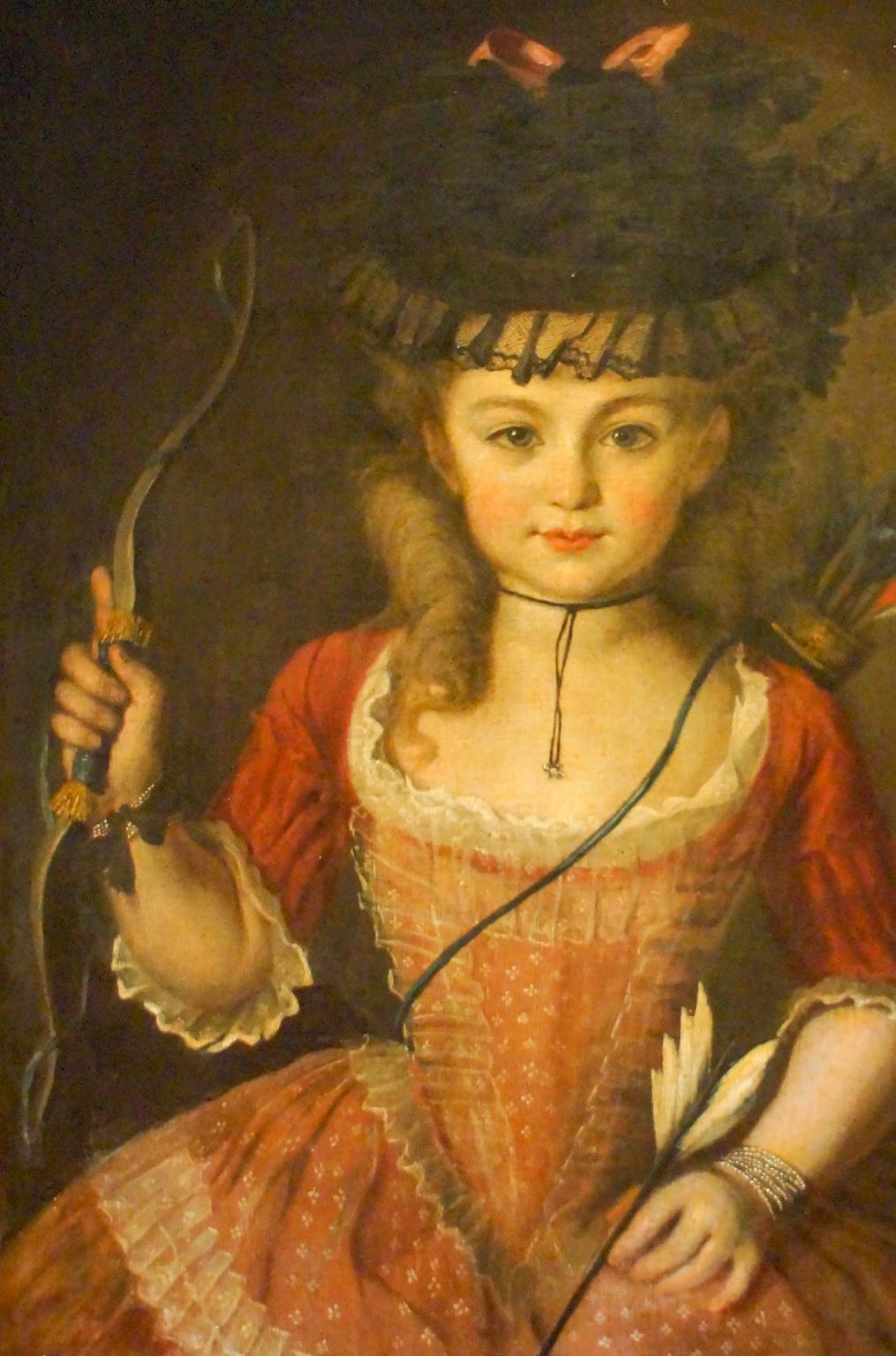 The girl is dressed as goddess Diana with bow and arrow. On the backside the painting is signed as 'Paint à Paris par Vermot, en 1775' (i.e. Painted in Paris by Vermot in 1775)

Oil on canvas, measures: 62x 73 cm (24.4 x 28.7 inches)

Frame