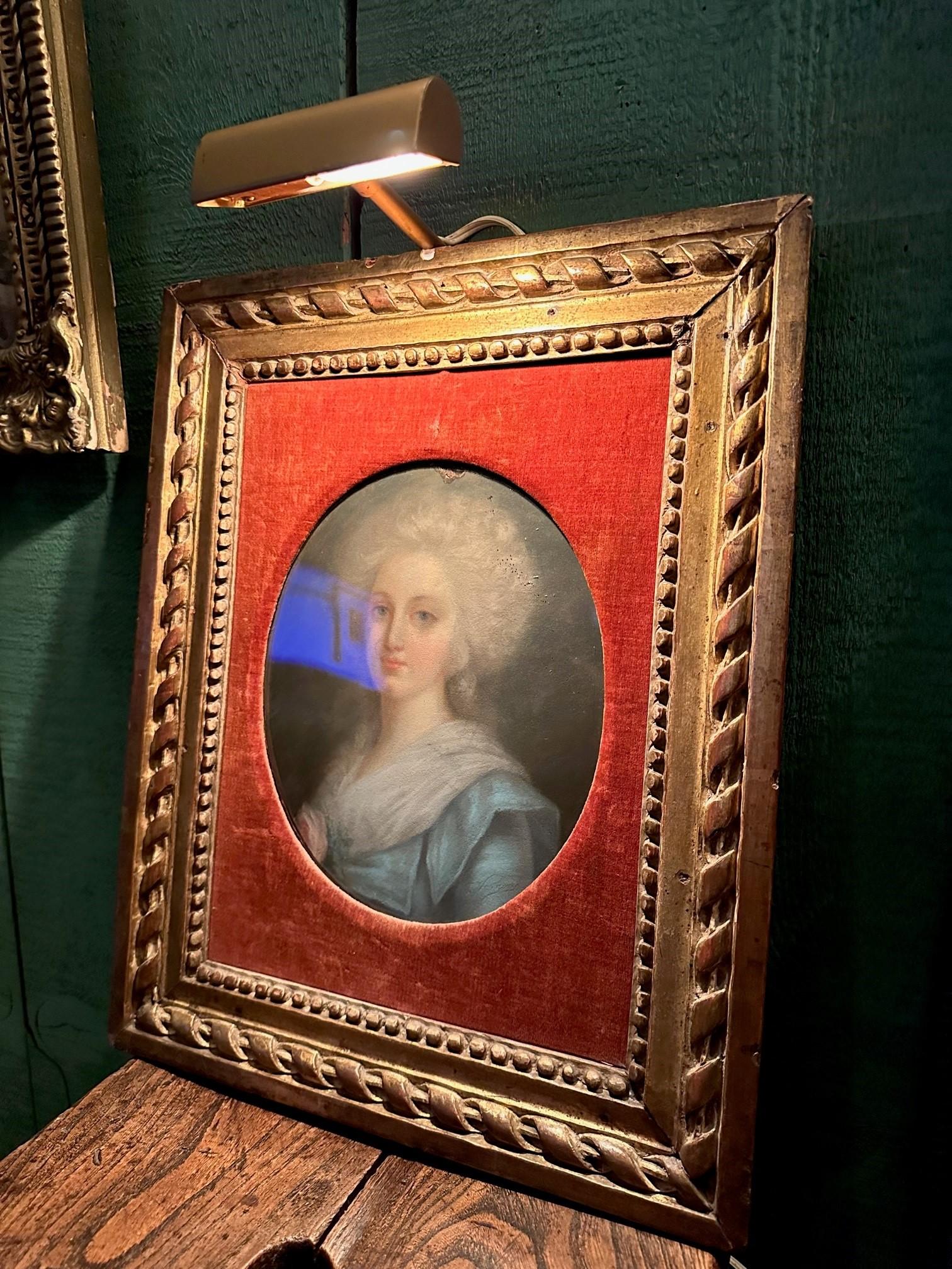 Portrait of a Lady Pastel 19th C. British School Antiques Los Angeles Gilt Wood. Small Charming Portrait painting in pastel paper Laid on Oval Board . A beautiful woman in a blue dress height 16