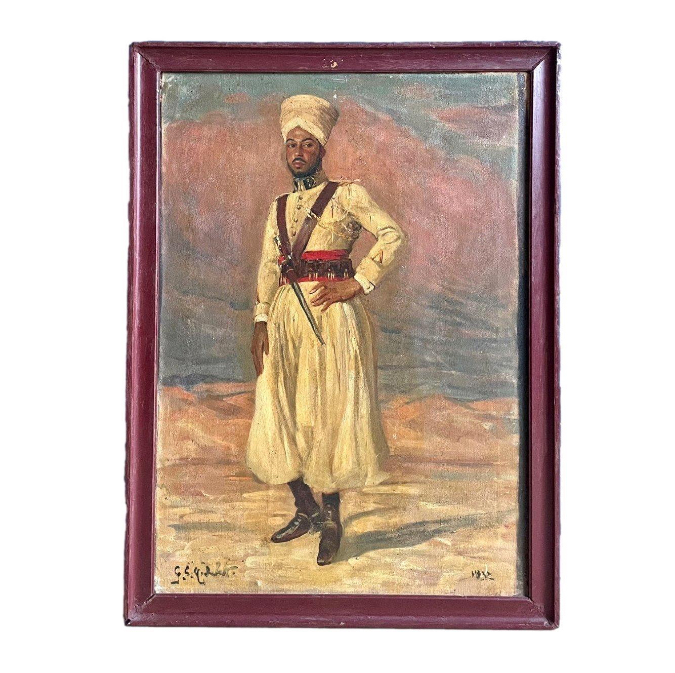 Porträt eines Spahi, signiert und datiert 1932″ Porträt eines jungen einheimischen Spahi, der seine Cheche trägt und in seine Gandoura gekleidet ist und seine Patronengürtel trägt, signiert von dem orientalistischen Maler Georges C. Michelet Breite: