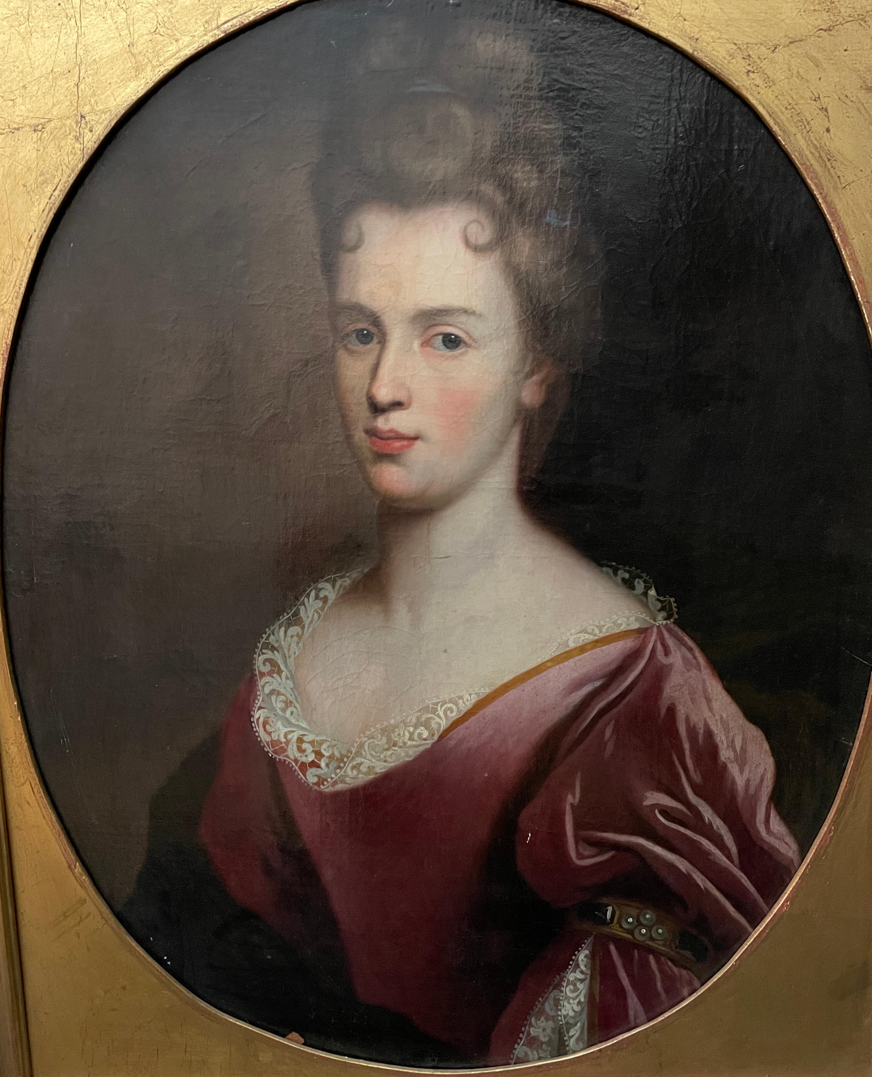 Portrait continental du 18e siècle d'une jeune femme, non signé. Huile sur toile, tableau ovale et châssis dans un cadre rectangulaire doré.