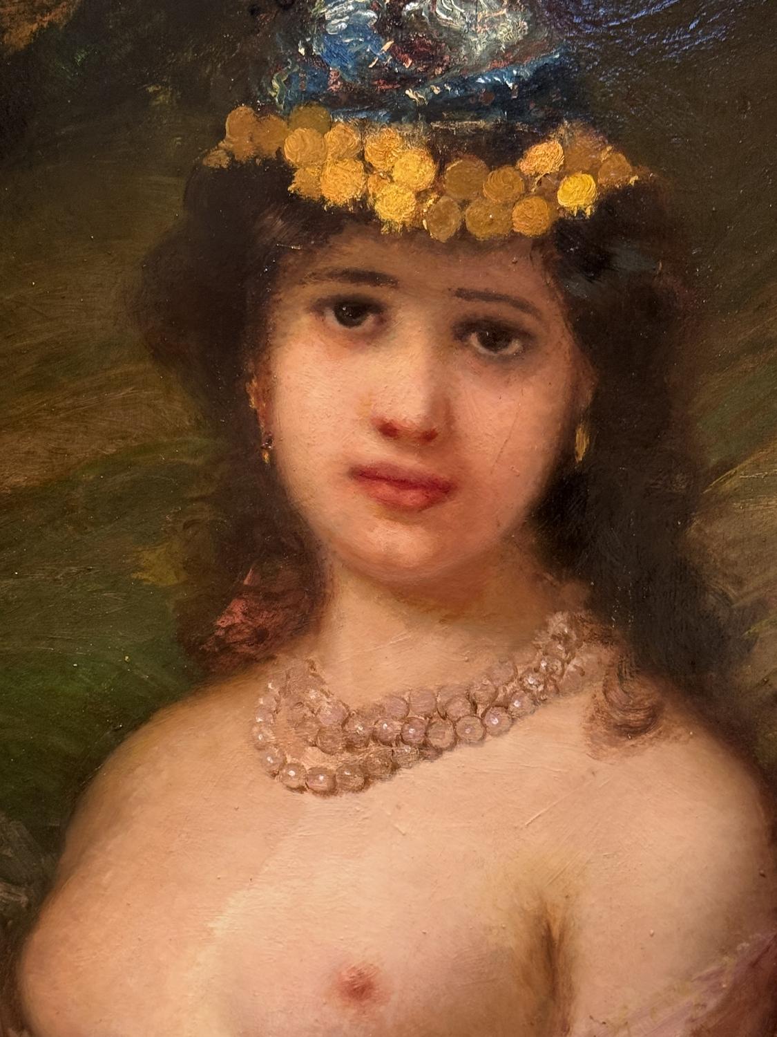 Oil on walnut panel representing a young nude Oriental girl, wearing a blue sequin cap and a triple pearl necklace.
Very charming atmosphere, undoubtedly signed by a good painter whose signature cannot be read in the lower right-hand corner