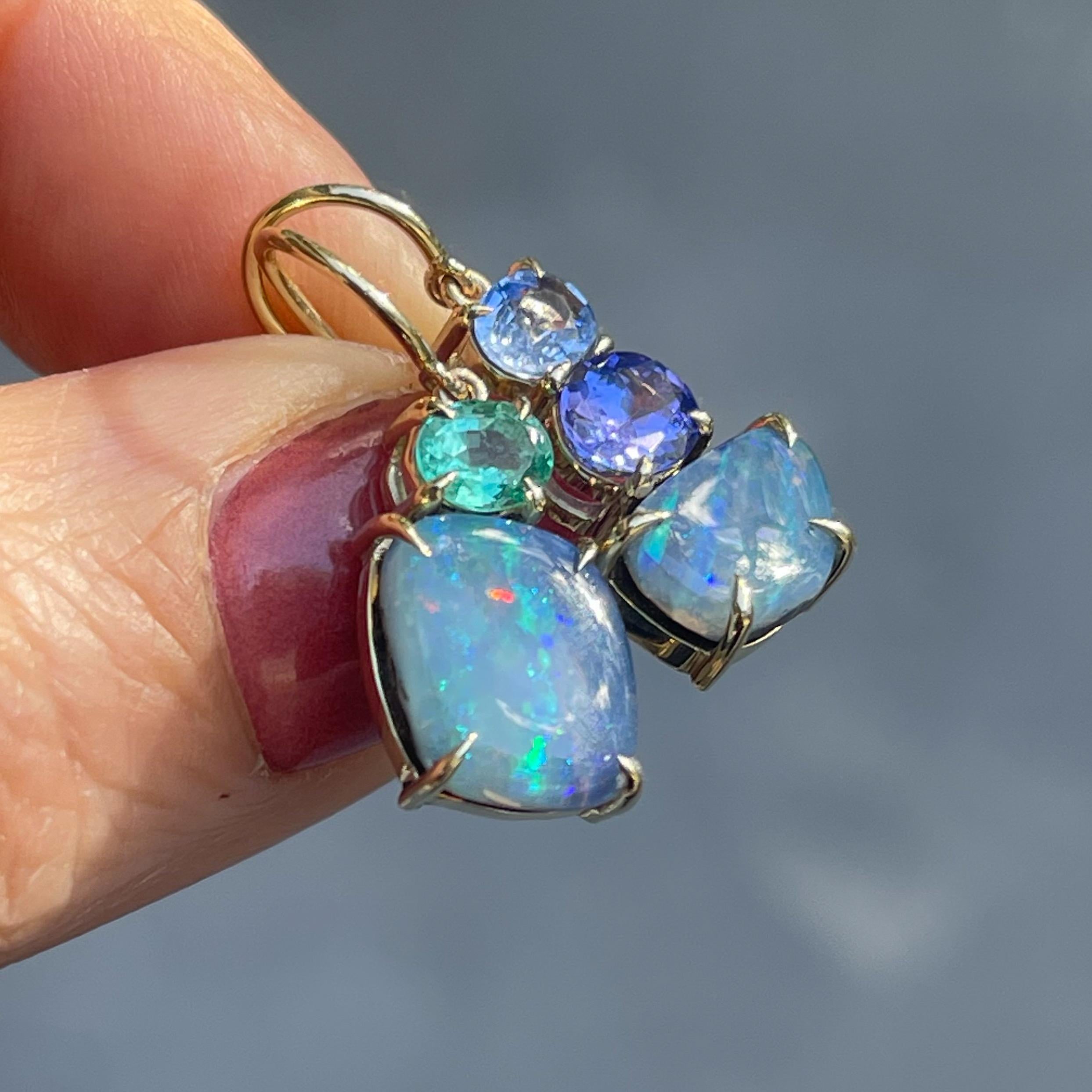 A sanctuary of beauty enchants in these Australian Opal Earrings. Boulder Opal oases are paired with the ultimate gems - tanzanite, sapphire, and emerald - to create an idyllic visual haven. Equal parts exotic and elegant, the opal expanses