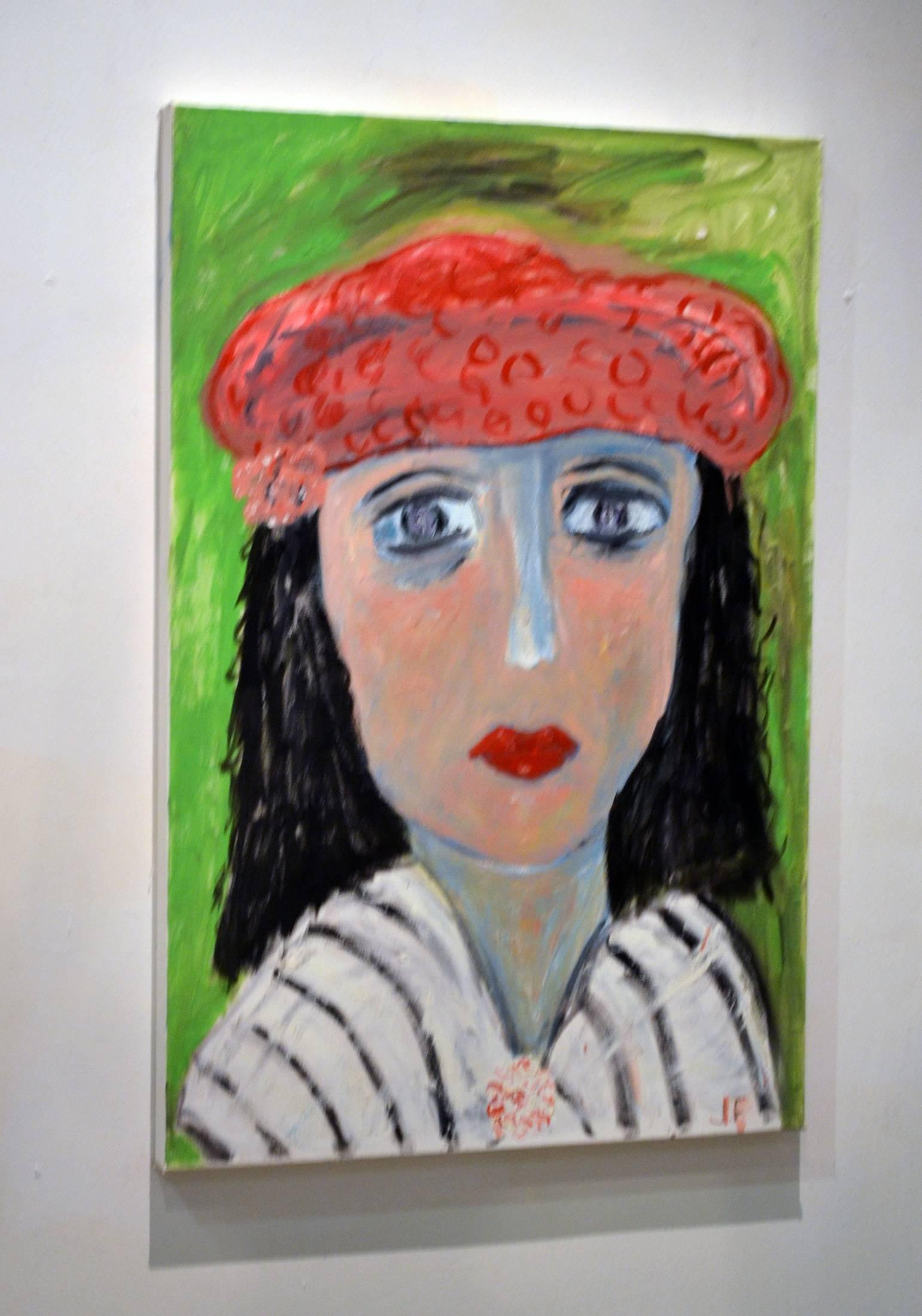 This exceptional Expressionist painting titled Portrait of Lady With Red Beret Against Green, Artist #1'18 is by highly listed and respected self-taught artist JoAnne Fleming (b. 1930). The artist's characteristic style exudes a primitive quality to