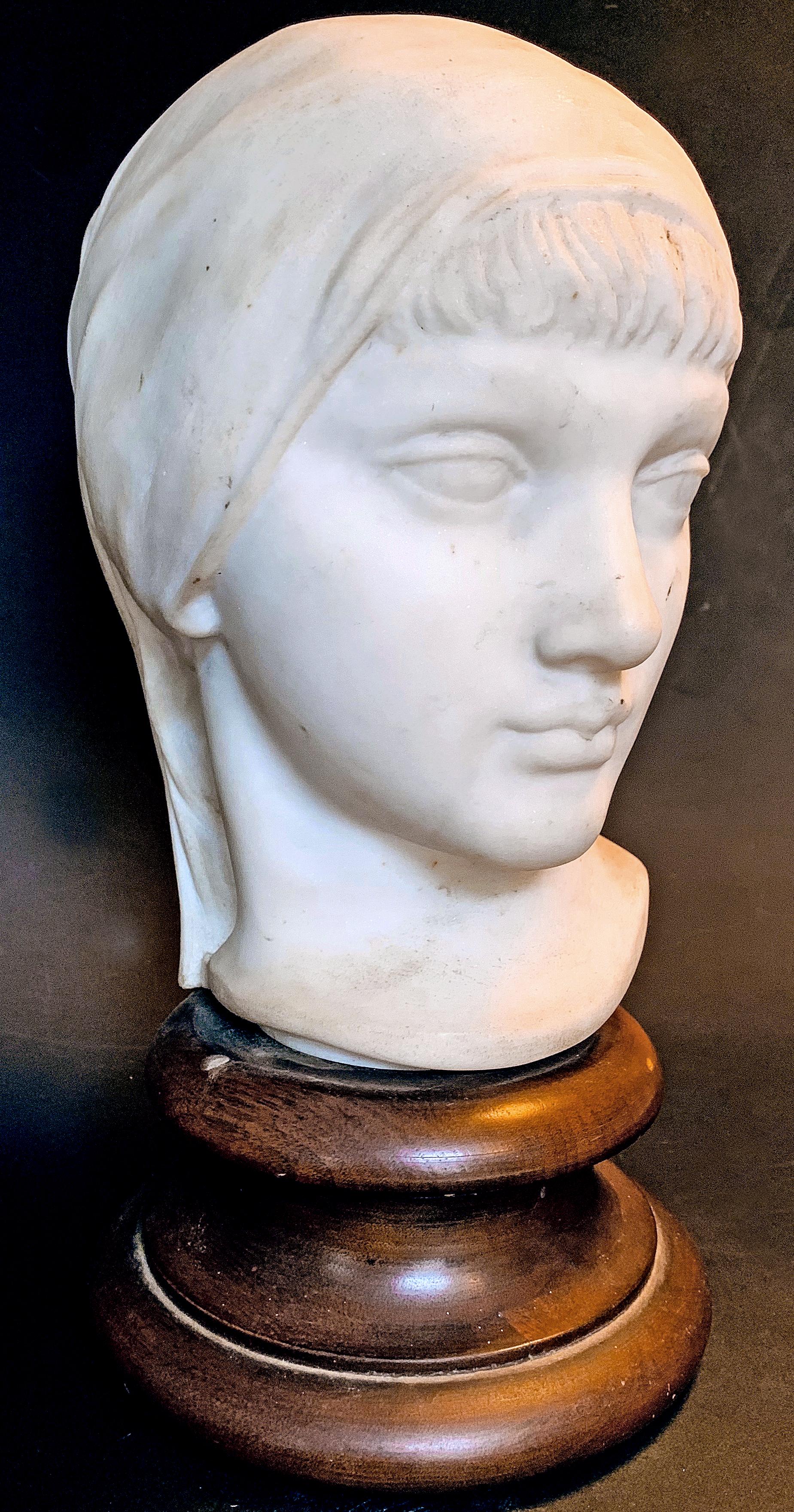 An extraordinary piece of American sculpture, this depiction of a young woman, dated 1930, was sculpted in white marble by John Gregory -- who executed 9 large bas relief panels for the Folger Shakespeare Library in Washington, D.C. -- for Paul