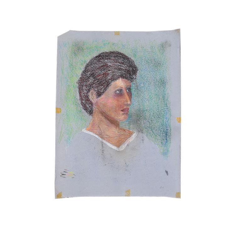 A lovely portrait sketch by Oklahoma artist Clair Seglem. This piece depicts a woman with short dark hair and a light blue v neck shirt. This piece is on blue paper. Measures: 18