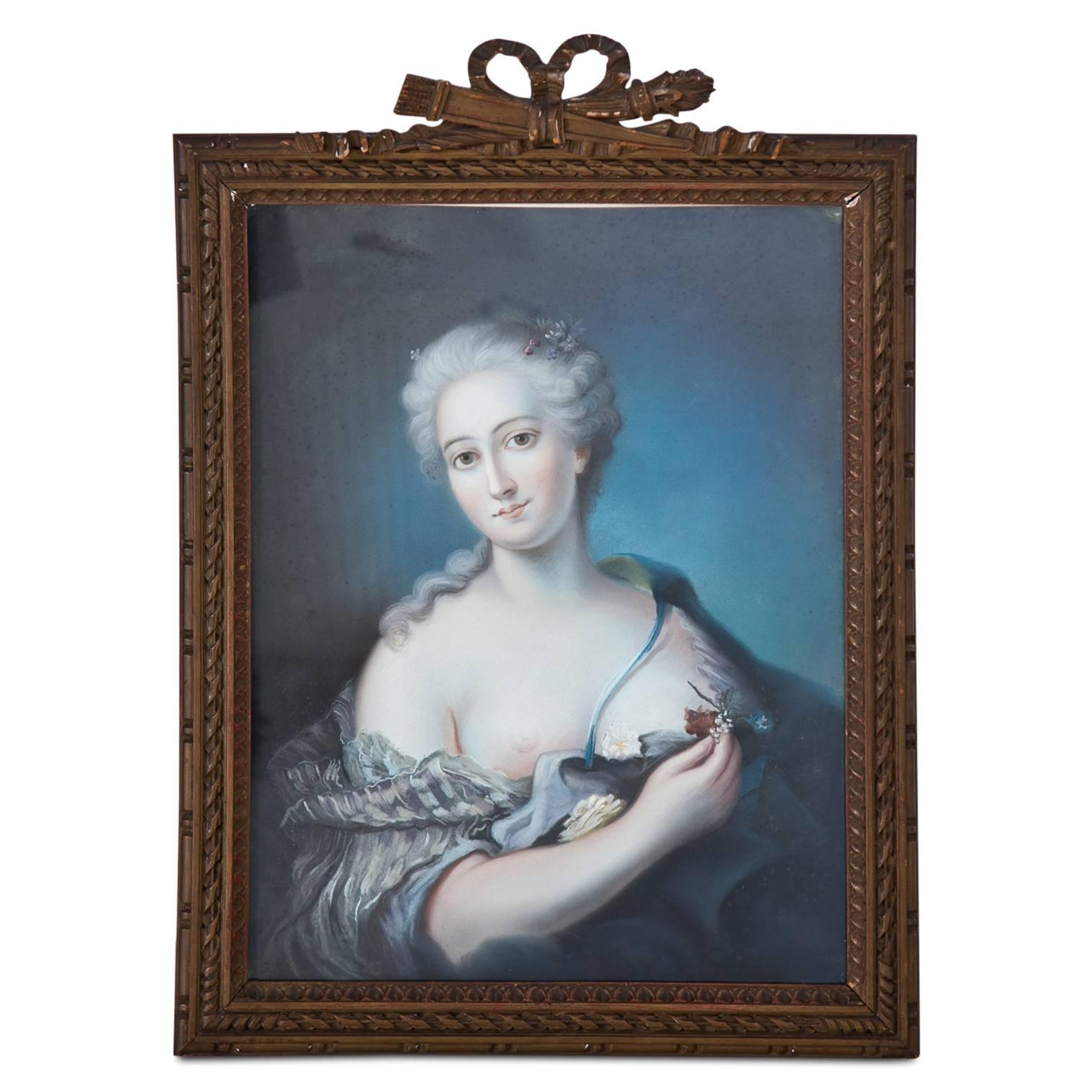 Pair of ladies’ portraits in front of a blue background in aristocratic clothing with flower décor. One lady has a straight posture and looks on straight to the spectator, the other one as the erotic pendant with an exposed breast. Frames are of the