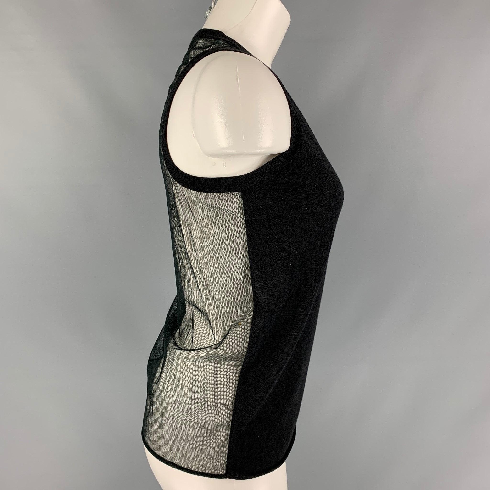 PORTS 1961 tank top black cotton and silk fabric featuring a see through style at back. Excellent Pre-Owned Condition. 

Marked:   S 

Measurements: 
  Bust: 37 inches Length: 24 inches 

  
  
 
Reference: 116440
Category: Casual Top
More Details
 