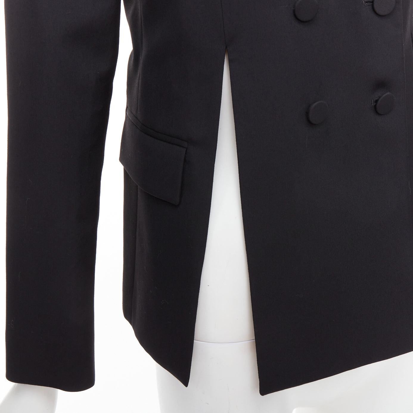 PORTS 1961 black wool silk slit front shoulder padded blazer IT40 S
Reference: NKLL/A00336
Brand: Ports 1961
Material: Wool, Silk
Color: Black
Pattern: Solid
Closure: Button
Lining: Black Fabric
Extra Details: Shoulder pads.
Made in: